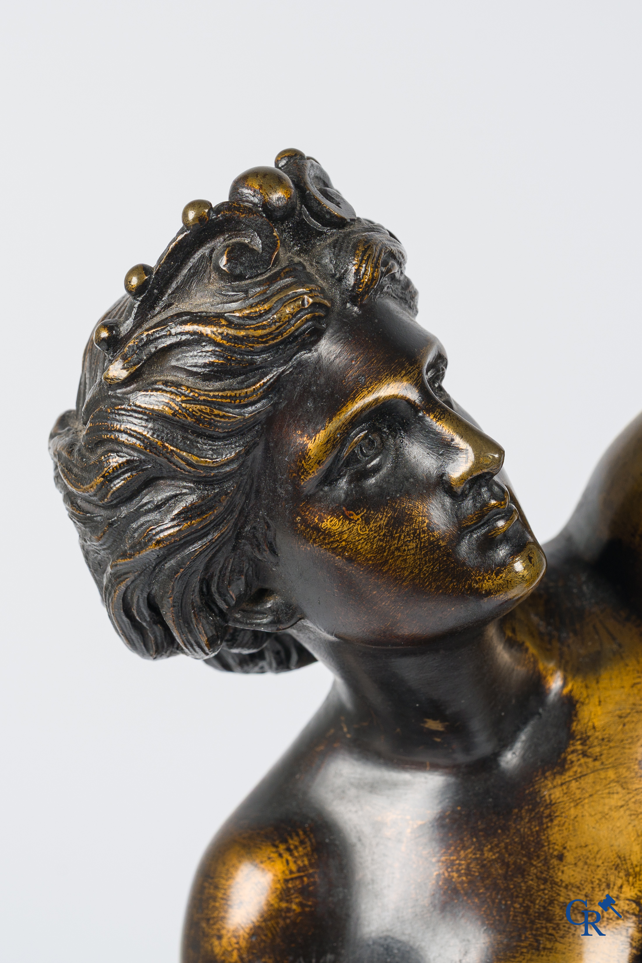 A pair of imposing bronze statues in the antique style after a model by Jean De Bologne.