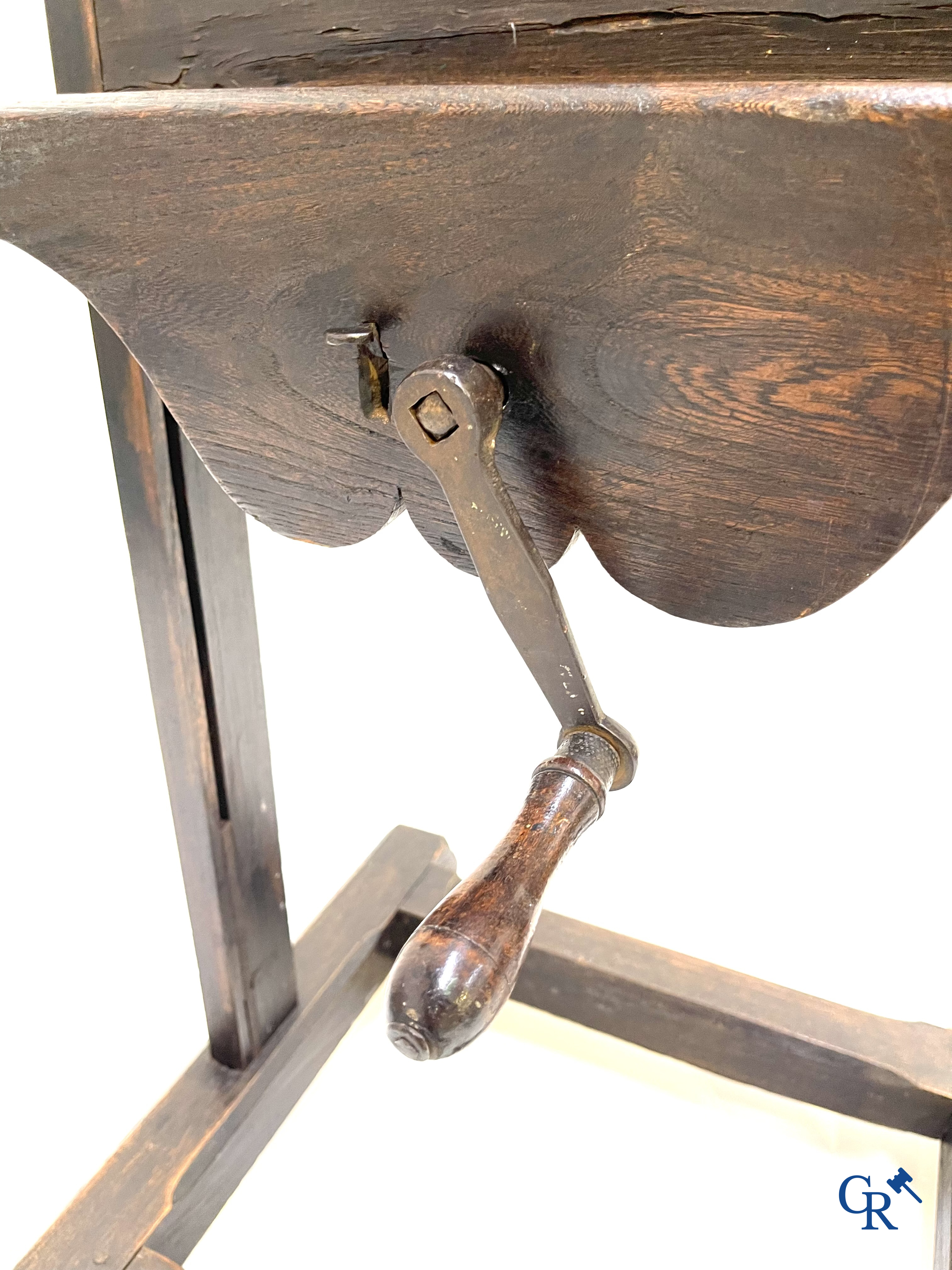 A large antique painter's studio easel with crank adjustment system. 19th century.