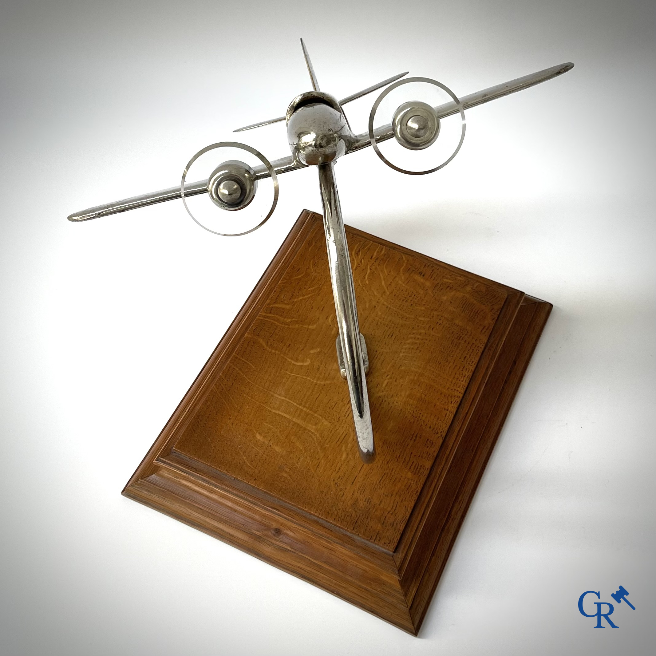 Art Deco, a large model of an aircraft taking off in chrome-plated bronze and glass propellers. 1930's.