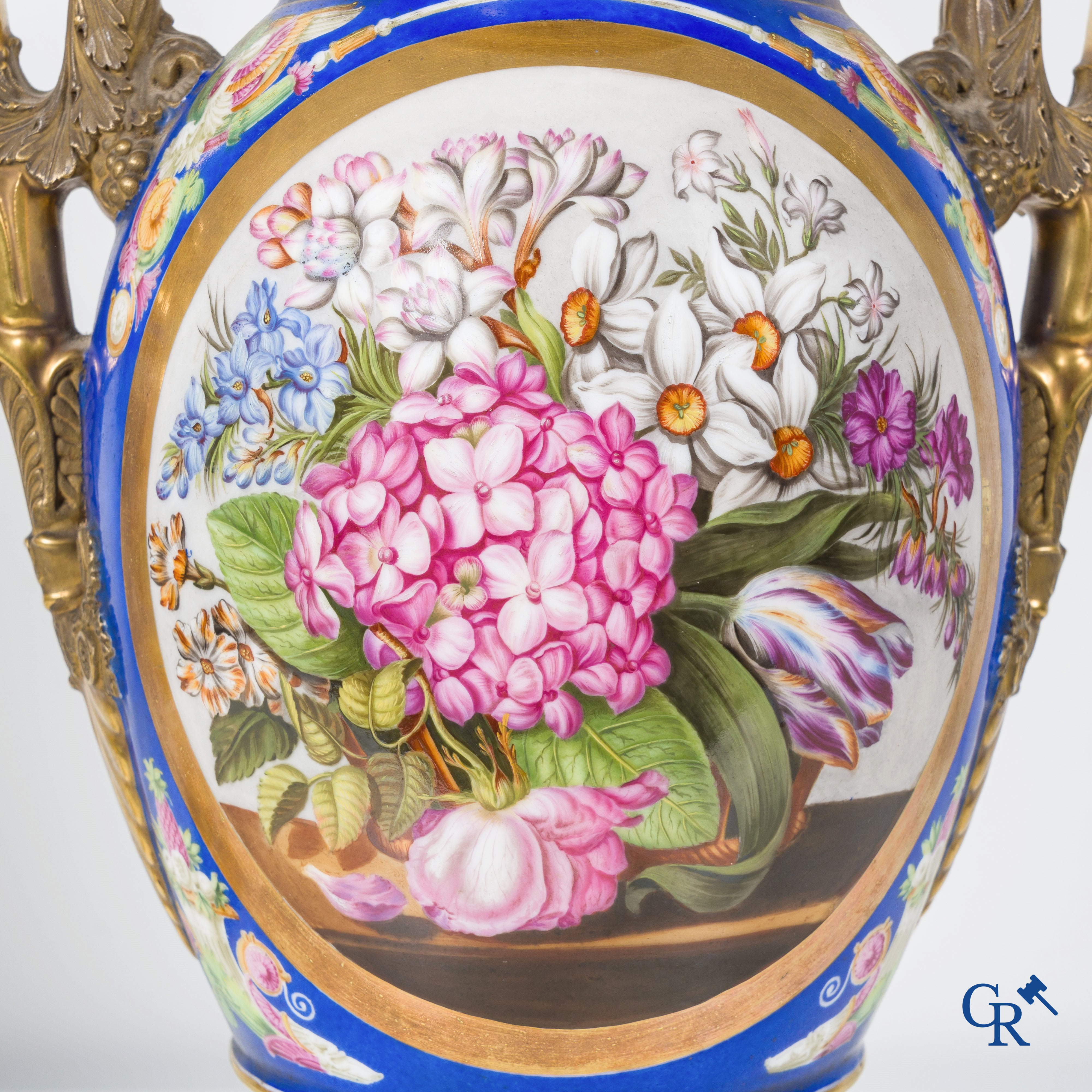 Empire, a pair of imposing multicolored decorated and gilded vases. Early 19th century.