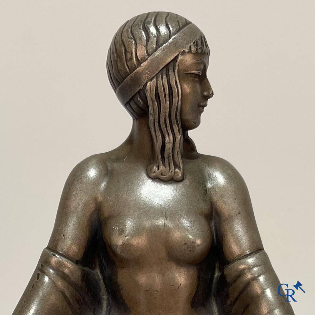 Max Le Verrier (1891-1973) Art Deco lamp with a silvered patina and a pressed glass in the manner of Lalique.