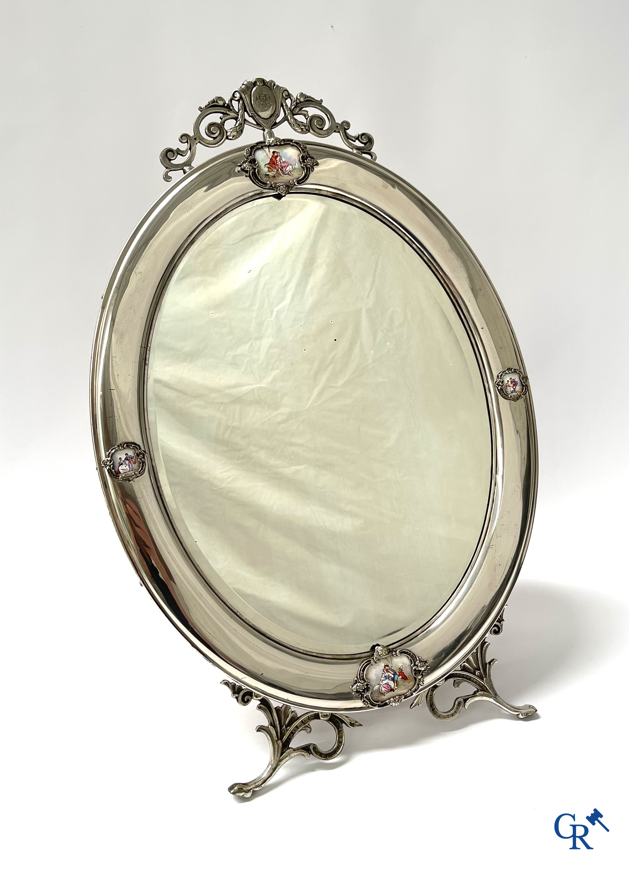 A seven-piece toilet set in silver-plated metal, finely cut crystal and enamelled plaques.