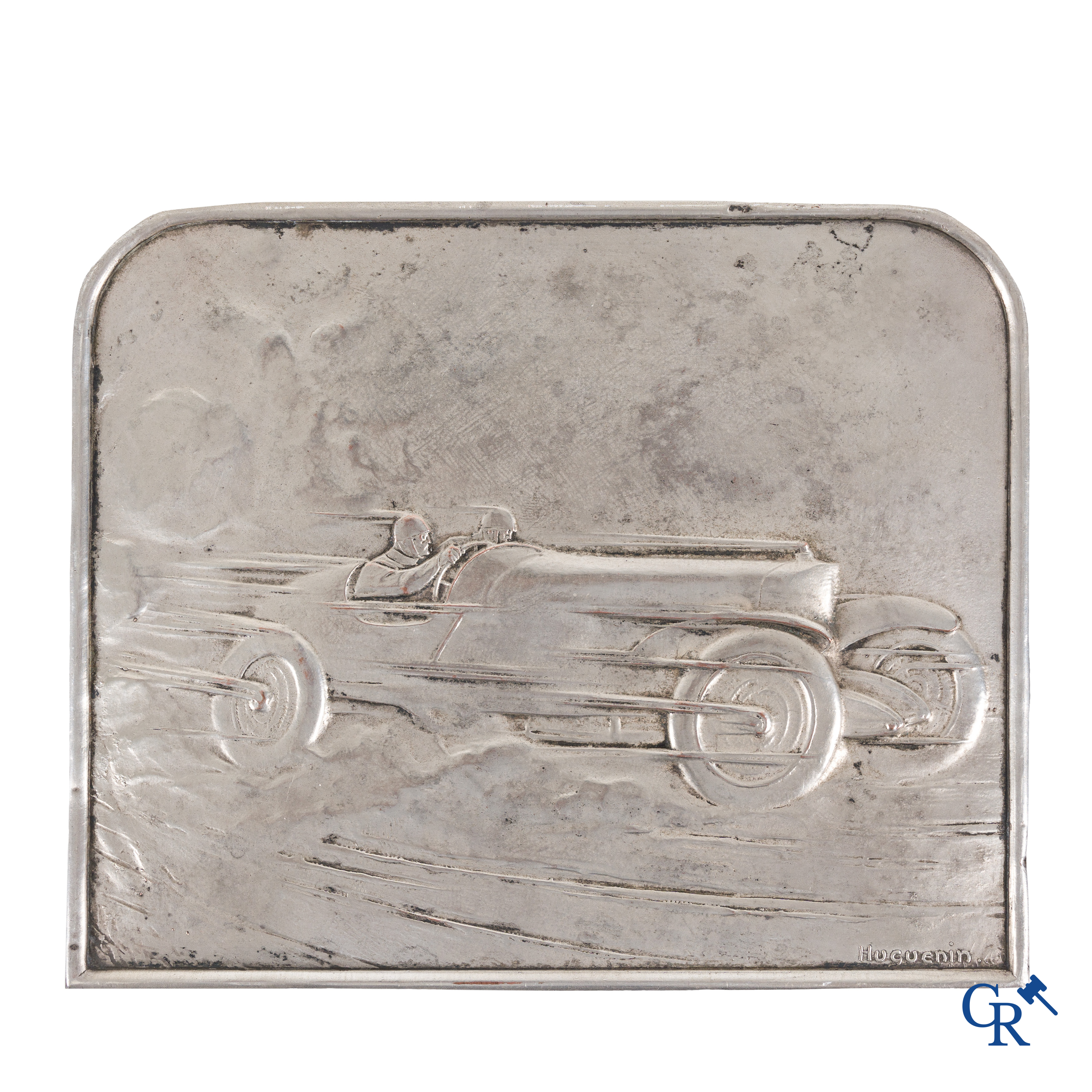 Automobilia, Huguenin Frères, Le Locle Zwitserland "En plein Vitesse" Bas-reliëf in verzilverd brons. Circa 1925.