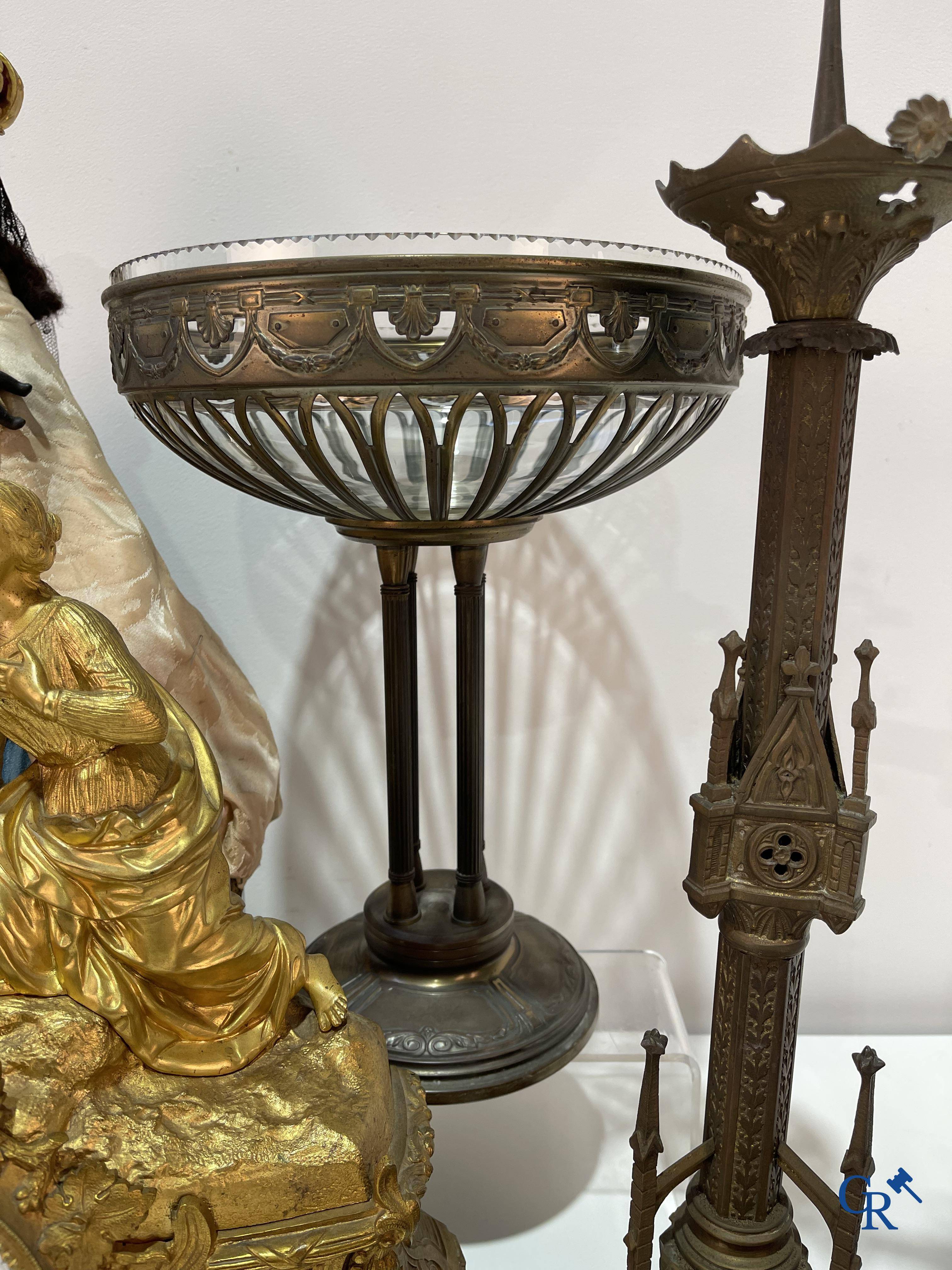 A lot with brocante: Bronze clock, bronze neo Gothic candlesticks and a statue of St. Catharina, soliflore etc.