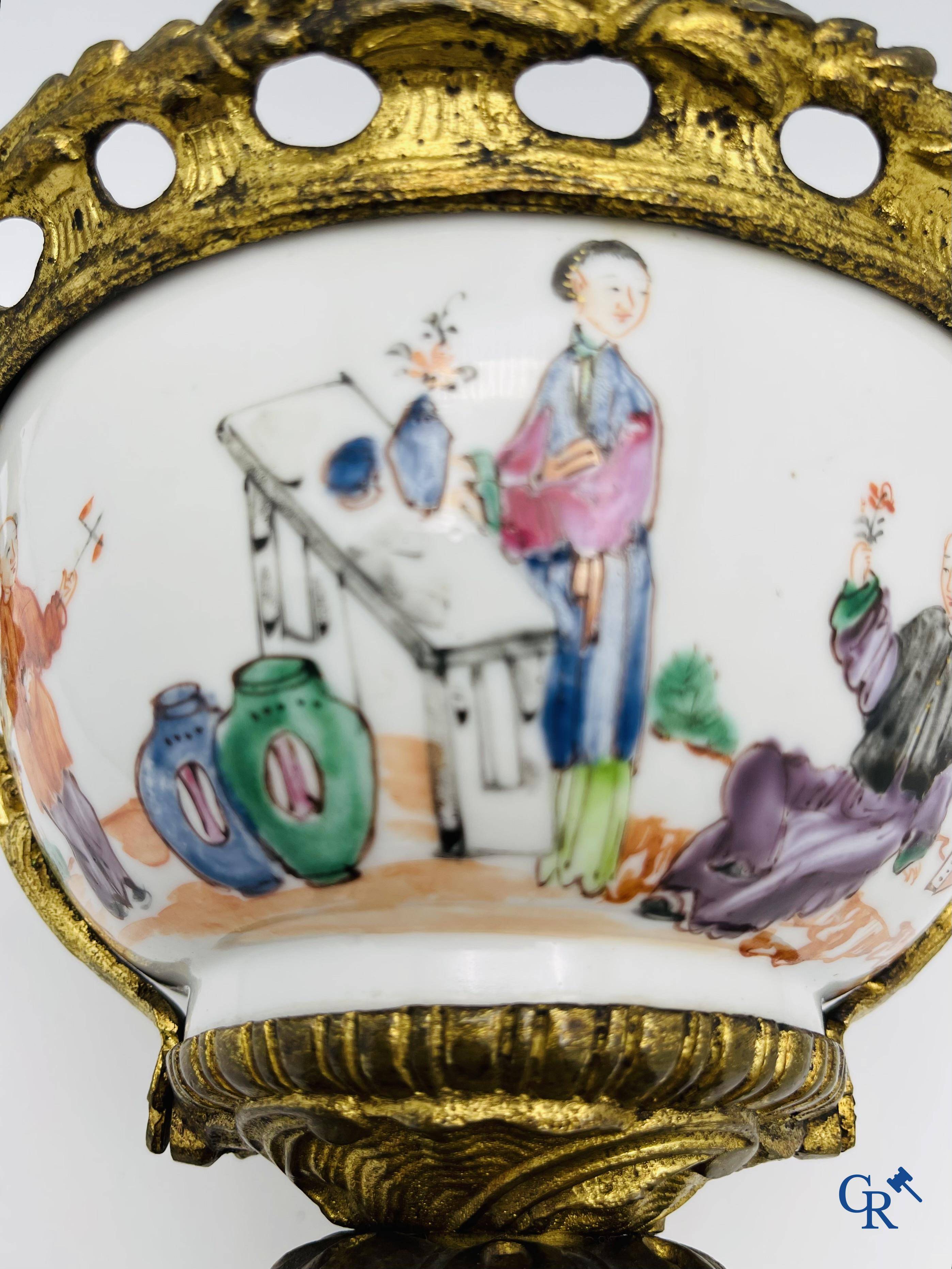 Chinese porcelain: An 18th century gilt-bronze mounted bowl in Chinese export porcelain.