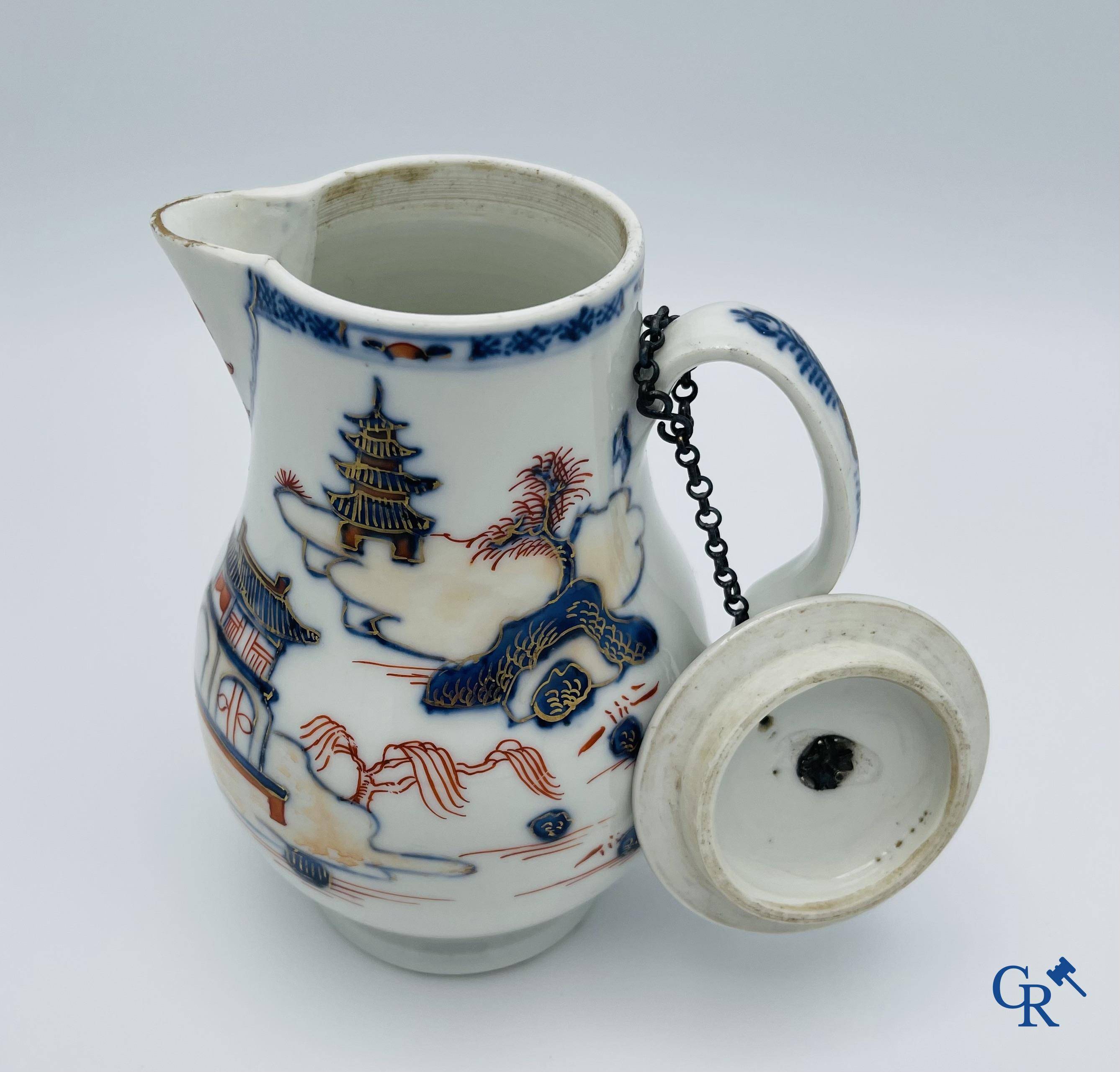 Asian Art: A Chinese silver mounted imari style lid jug. Qianlong period.