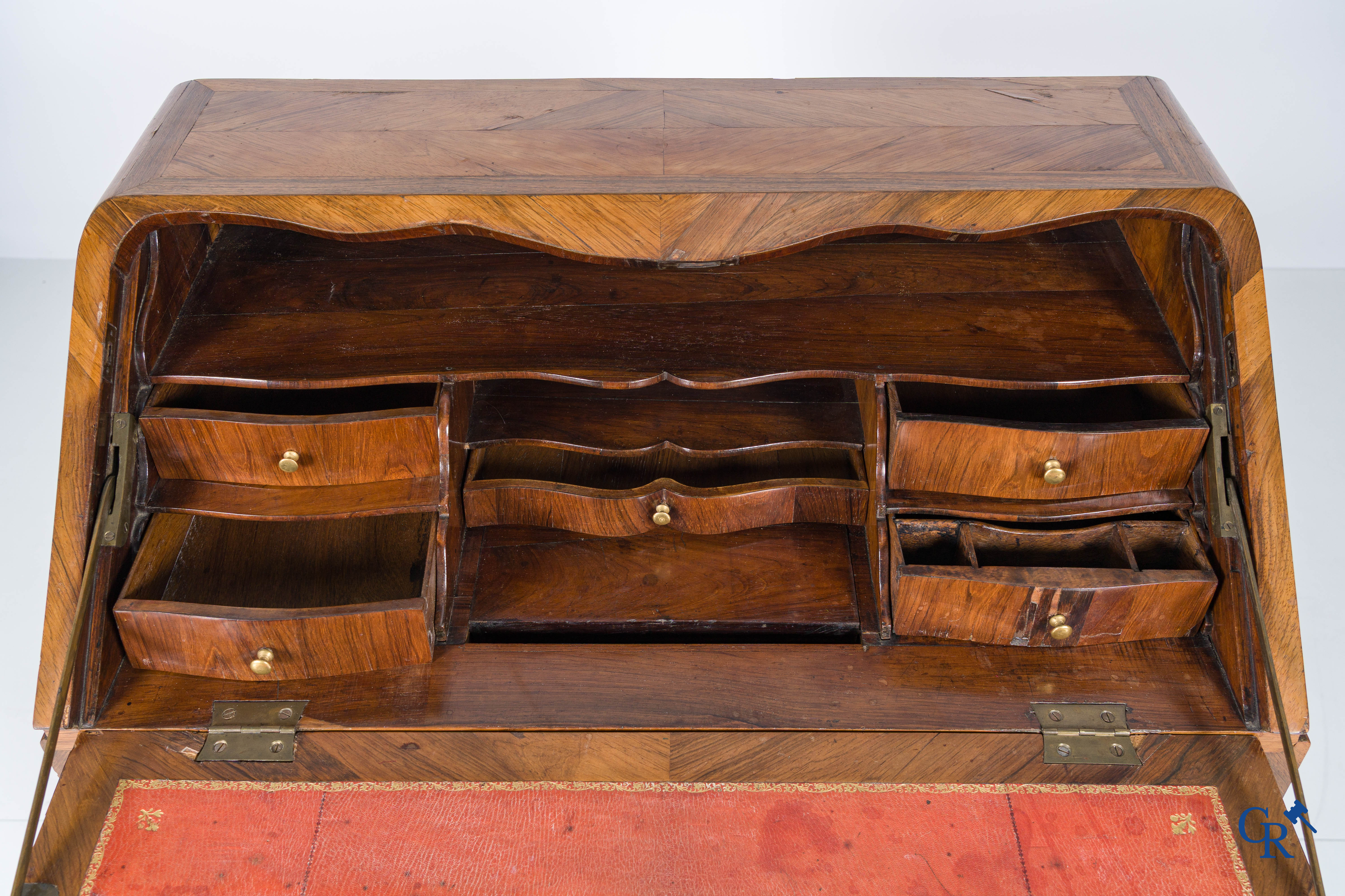 Louis XV period. A so-called "Bureau de pente" in rosewood veneer and marquetry. 18th century.
