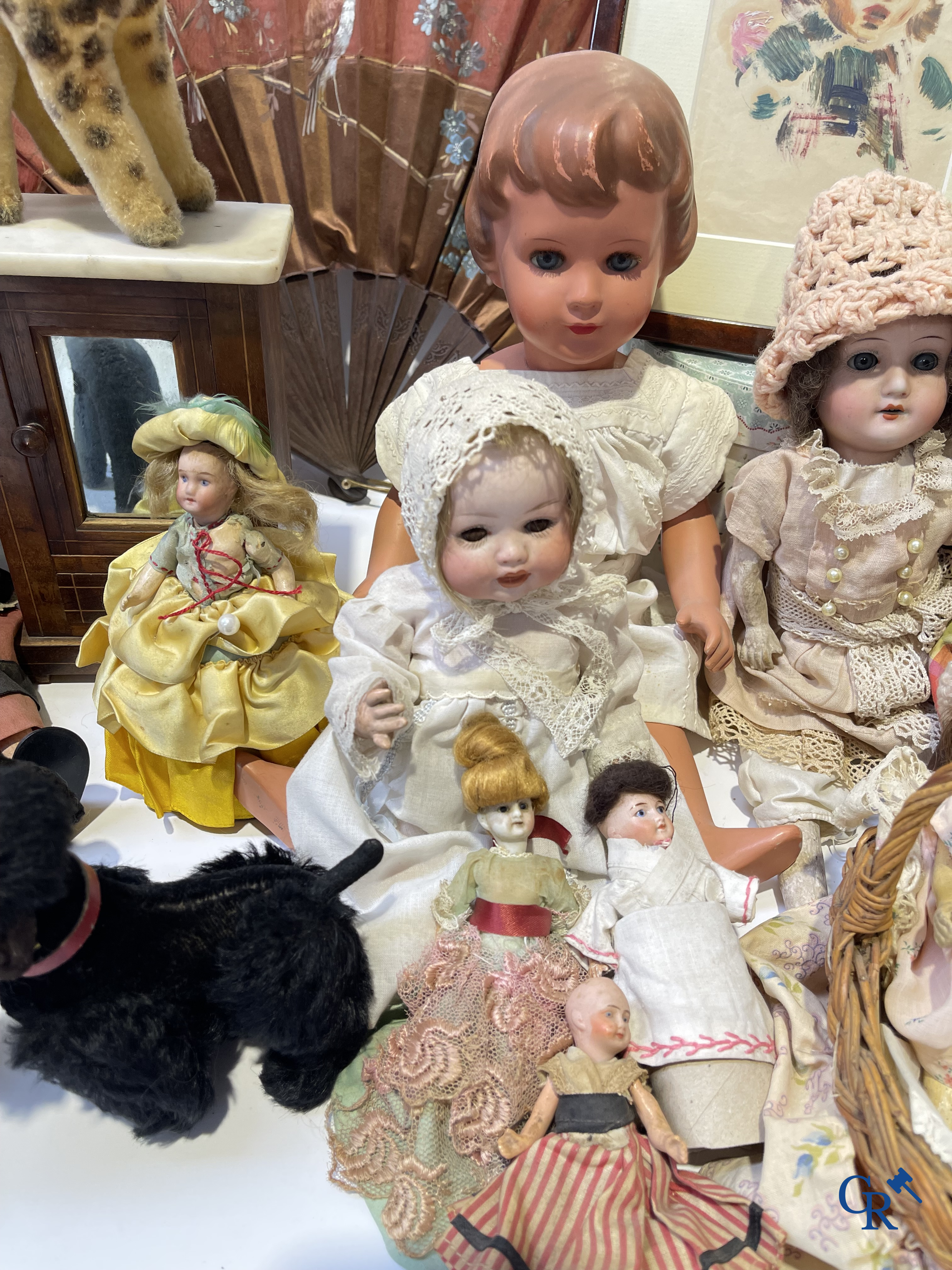 Old toys, a big lot with different antique dolls and collectibles.
