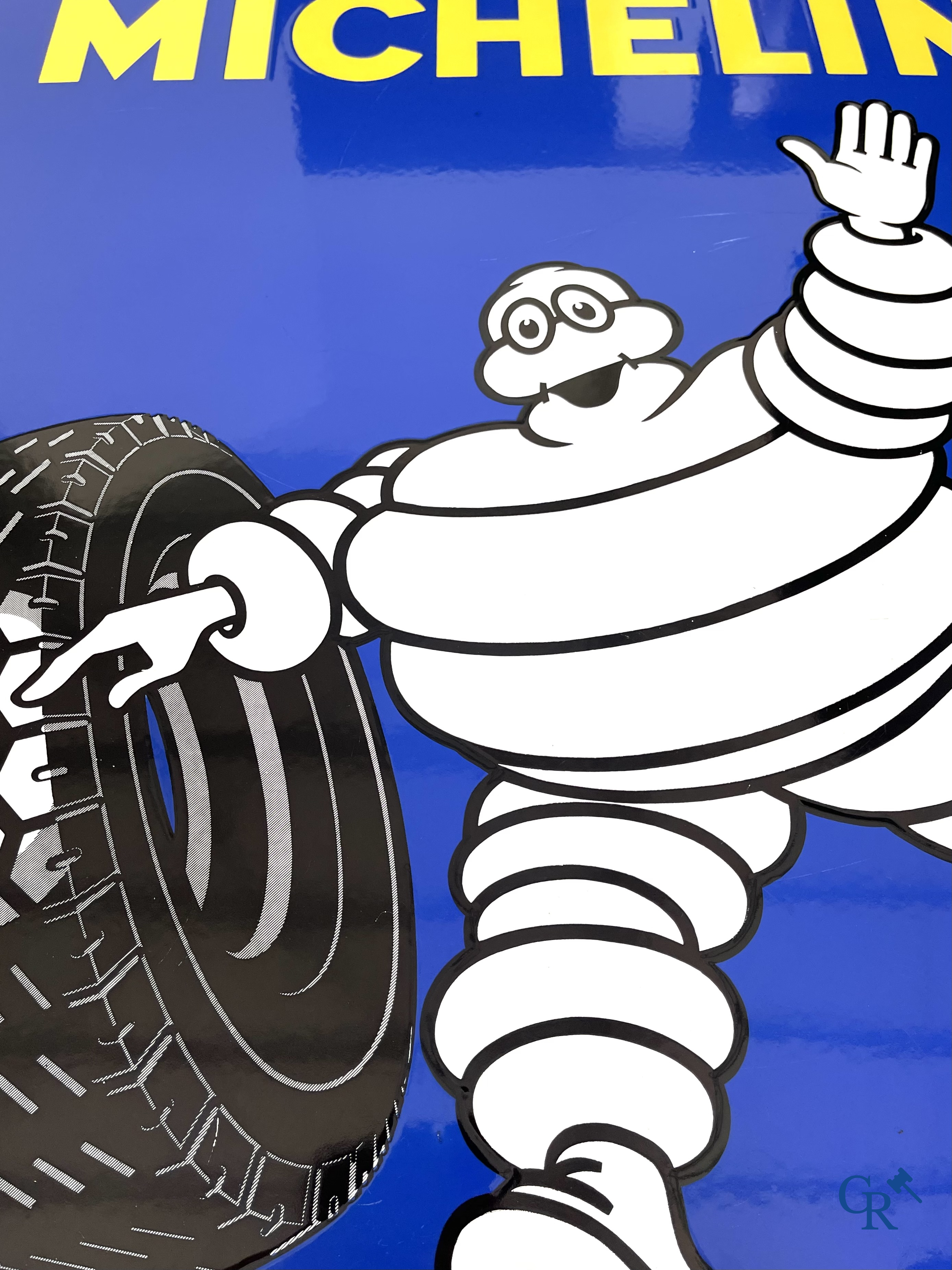 Michelin, Large enamel advertising sign of the running Bibendum with tire. Emaillerie Alsacienne Strasbourg.
