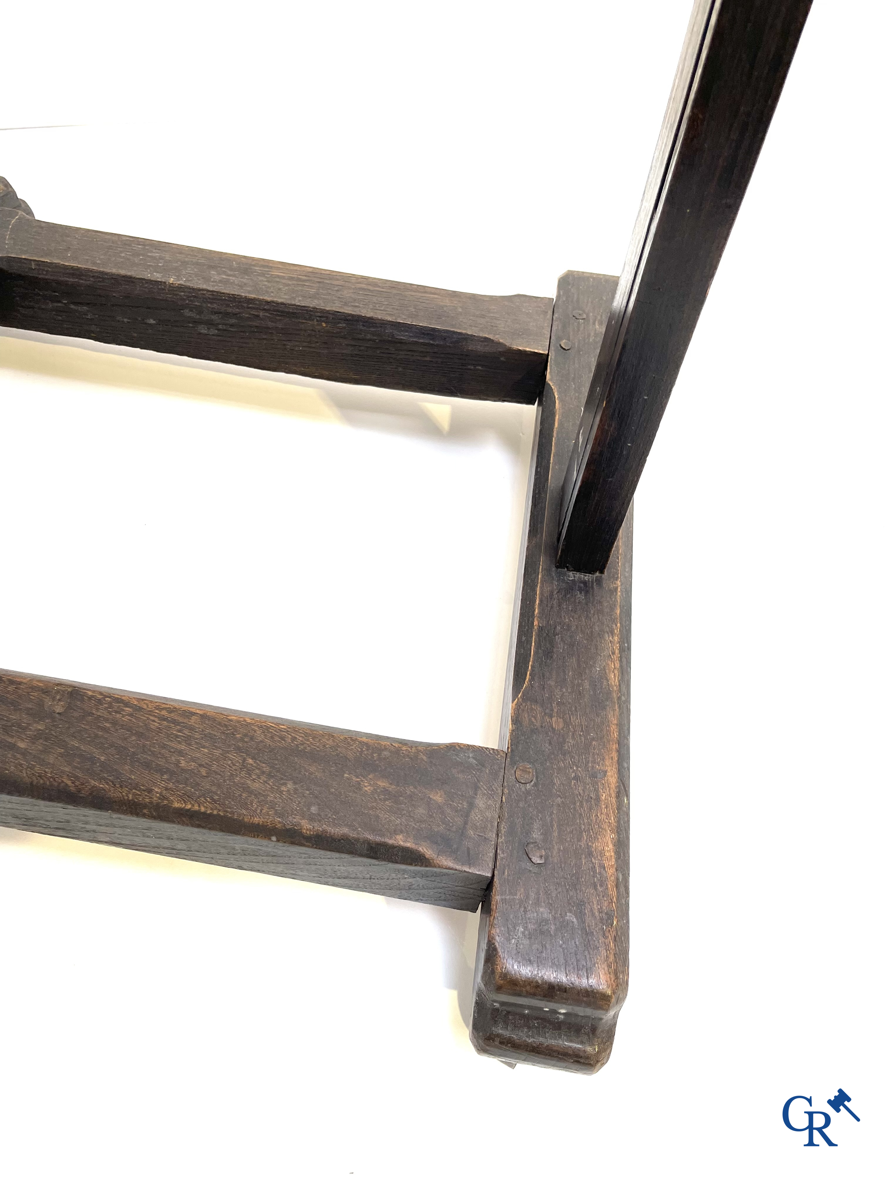A large antique painter's studio easel with crank adjustment system. 19th century.