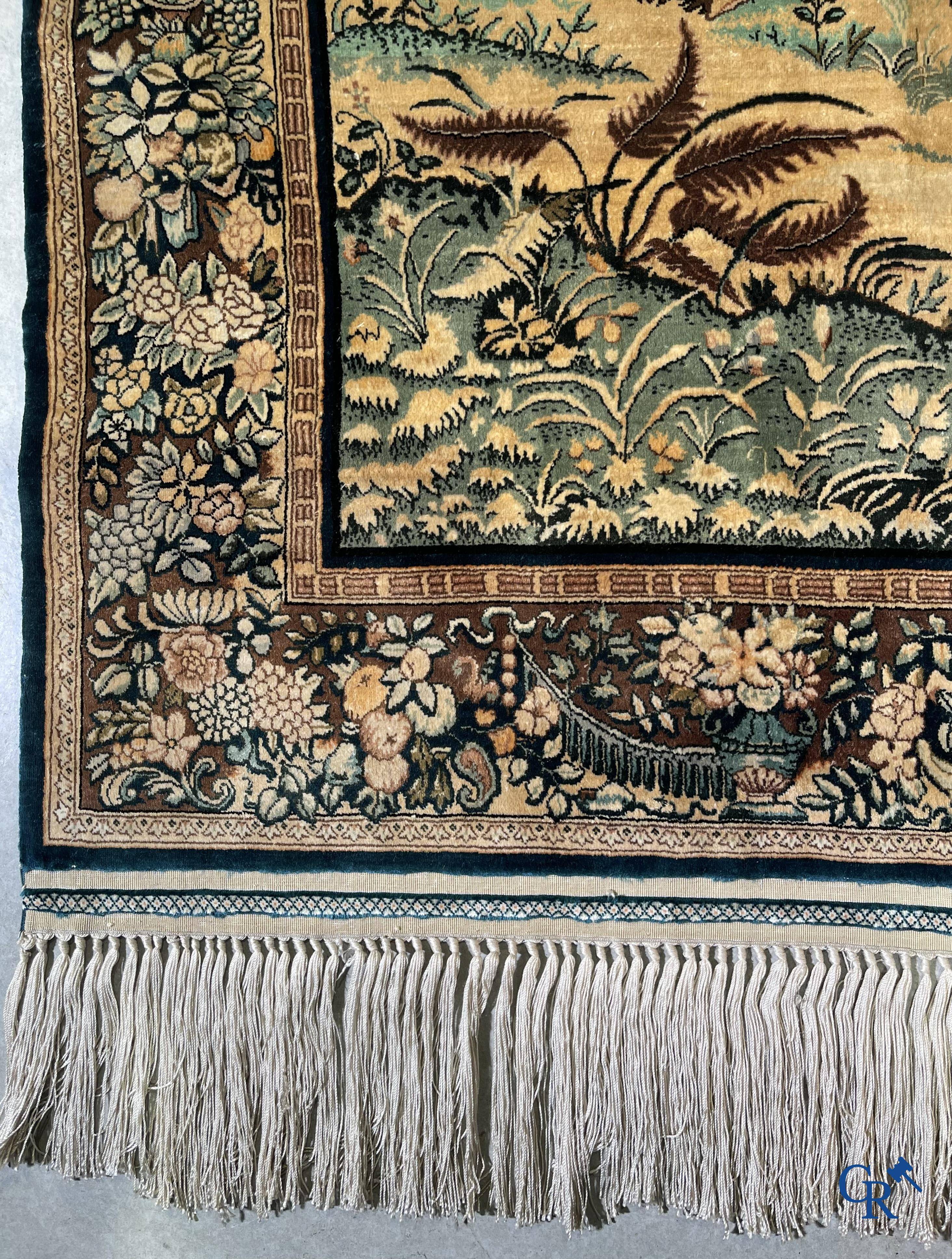 Oriental carpets, a finely knotted silk tapestry with Renaissance scenes. Signed.