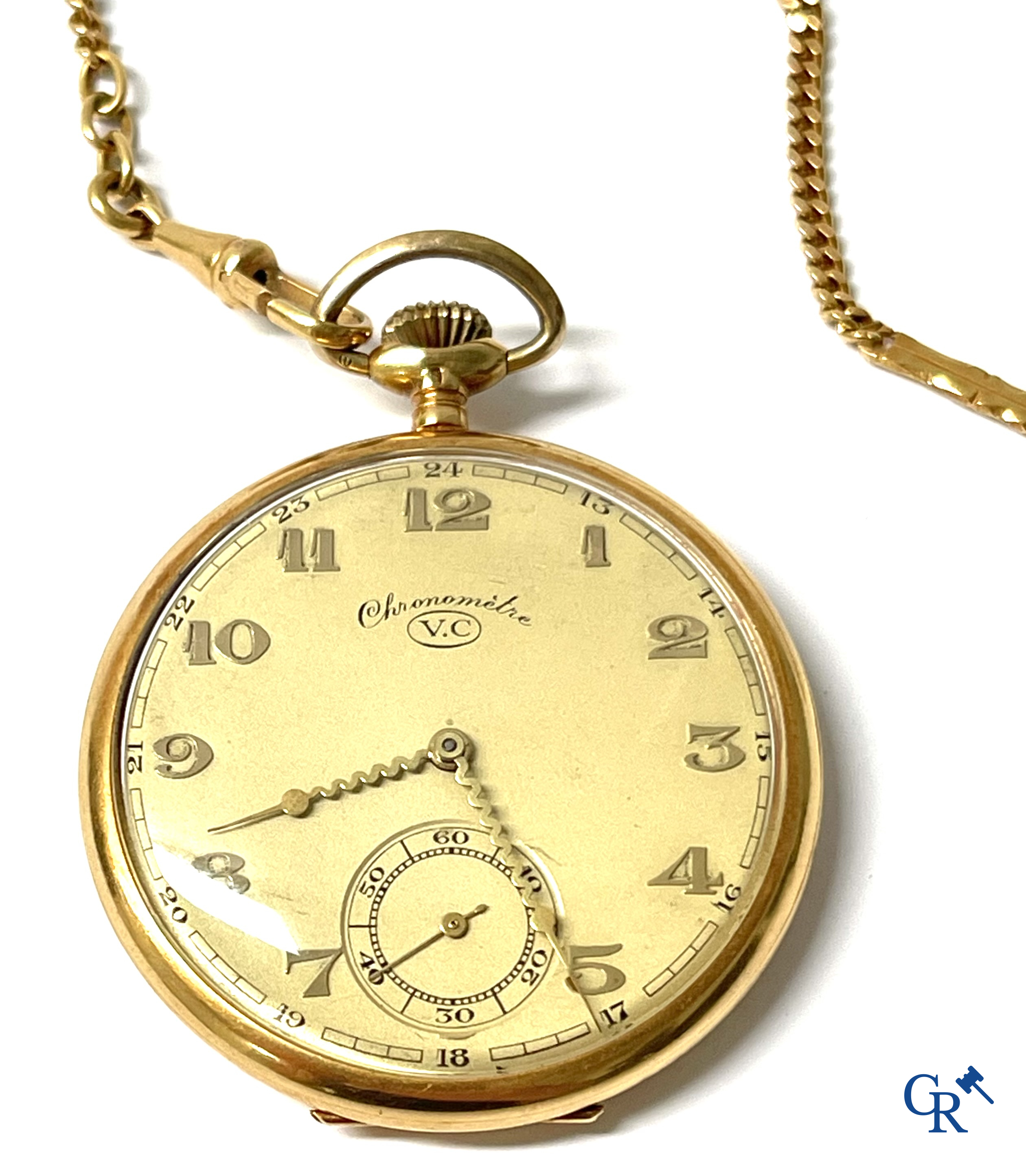 Jewellery, timepieces. A pocket watch with chain in gold 750°/00. Marked Chronomètre V.C.