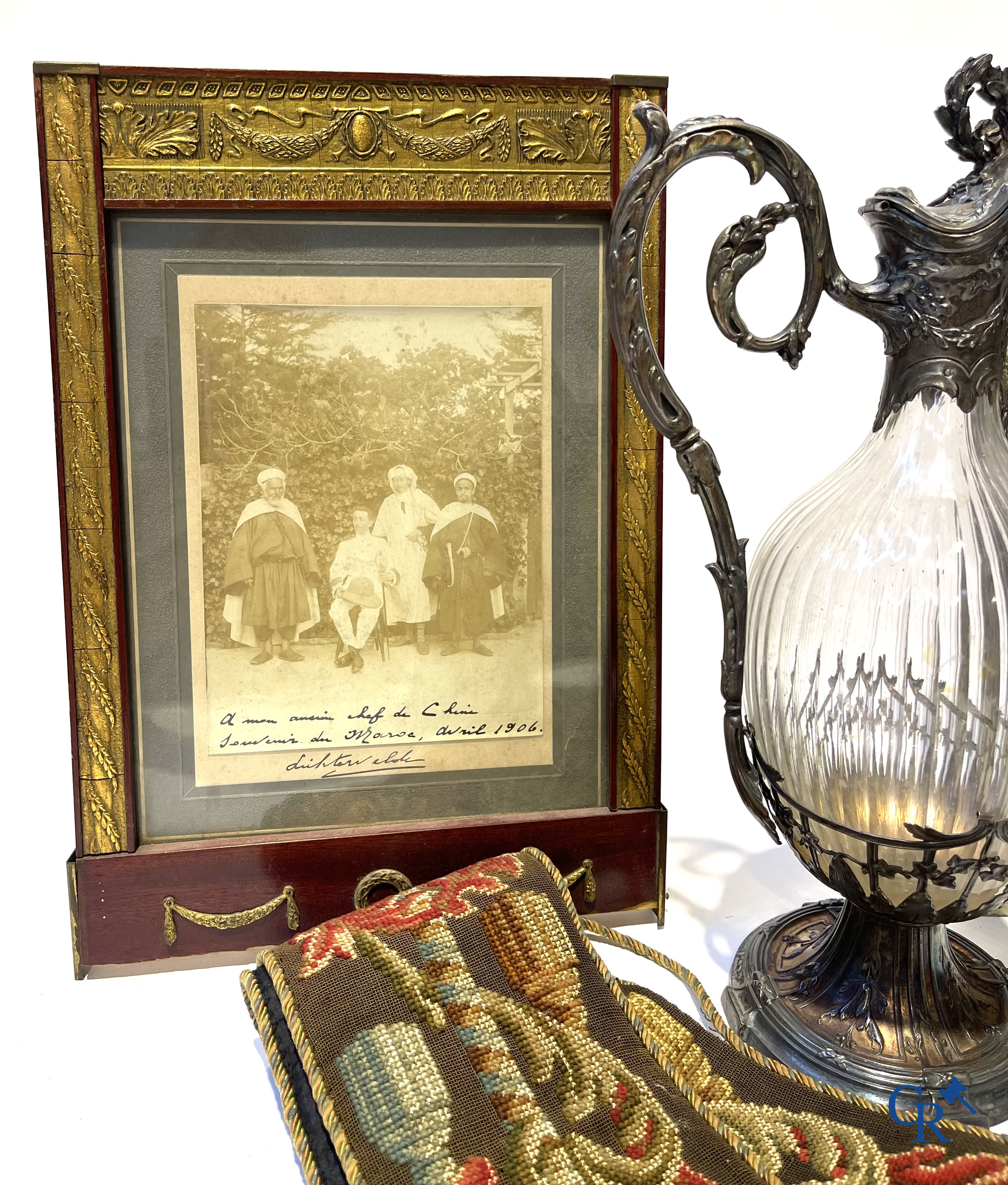 A nice lot of brocante, carafe with silver mounts, painting, wooden bust, old photo, etc.