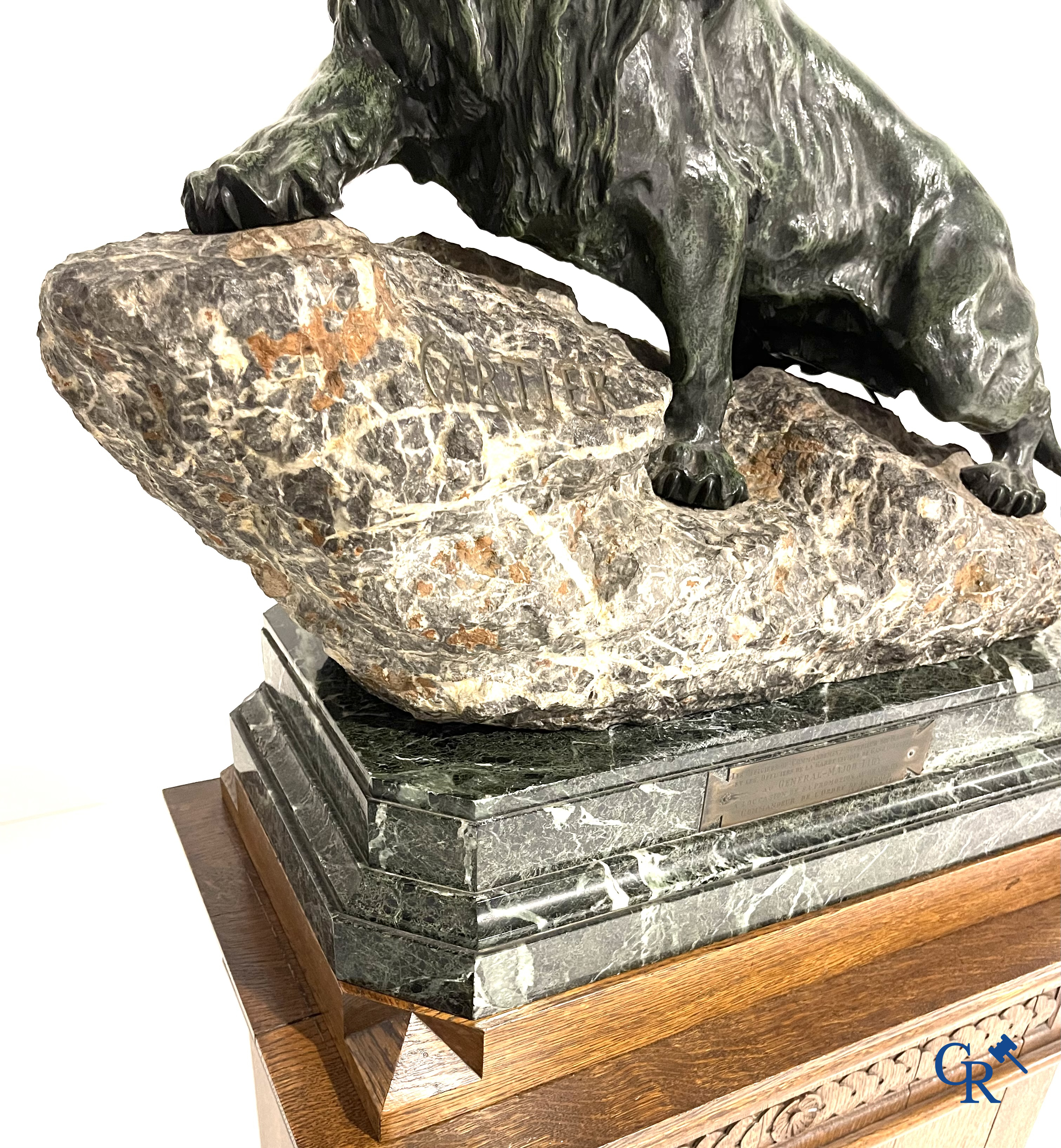 Thomas François Cartier (1879-1936) "Roaring lion" Important statue in bronze and stone on a wooden base.