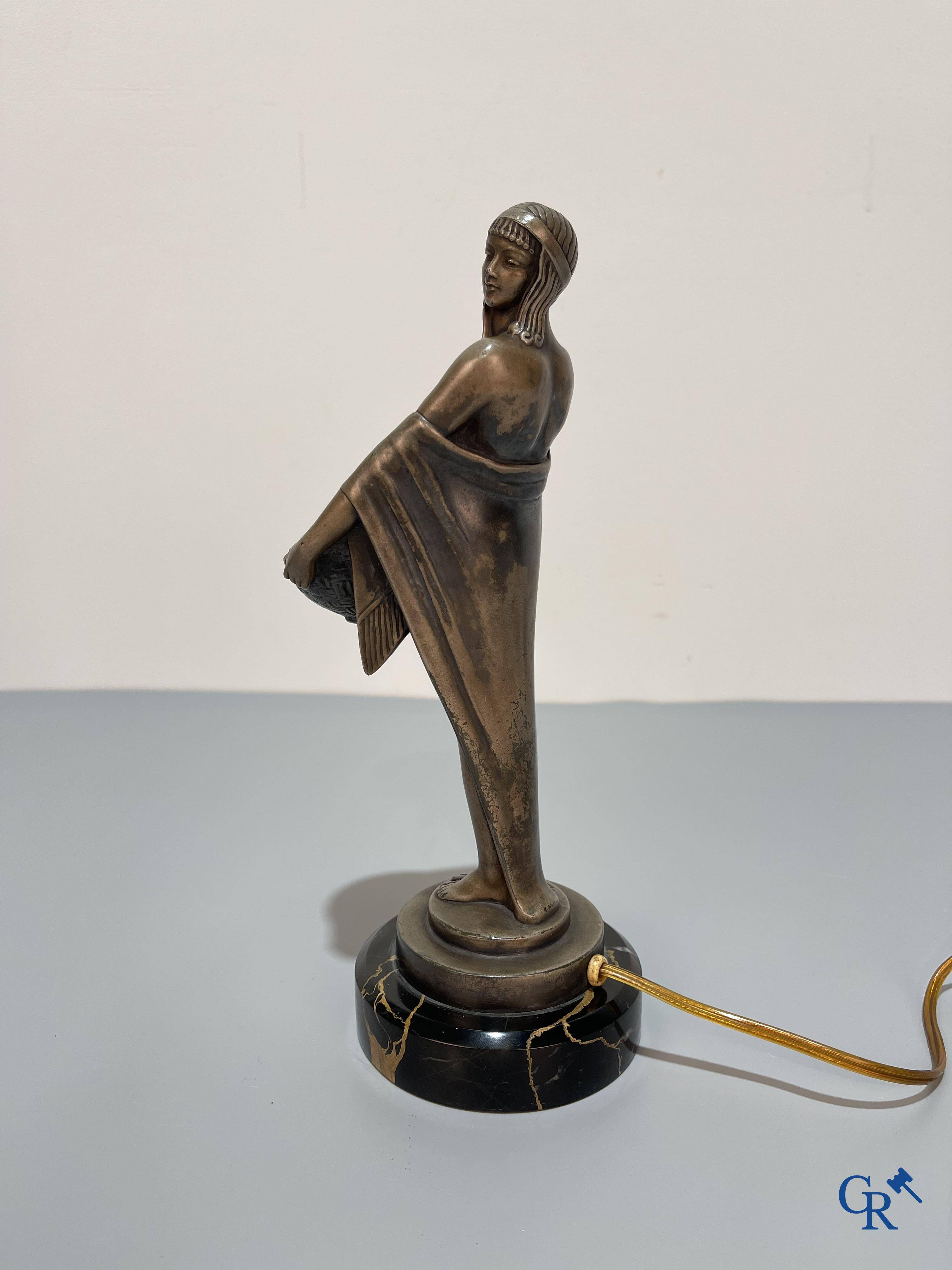 Max Le Verrier (1891-1973) Art Deco lamp with a silvered patina and a pressed glass in the manner of Lalique.