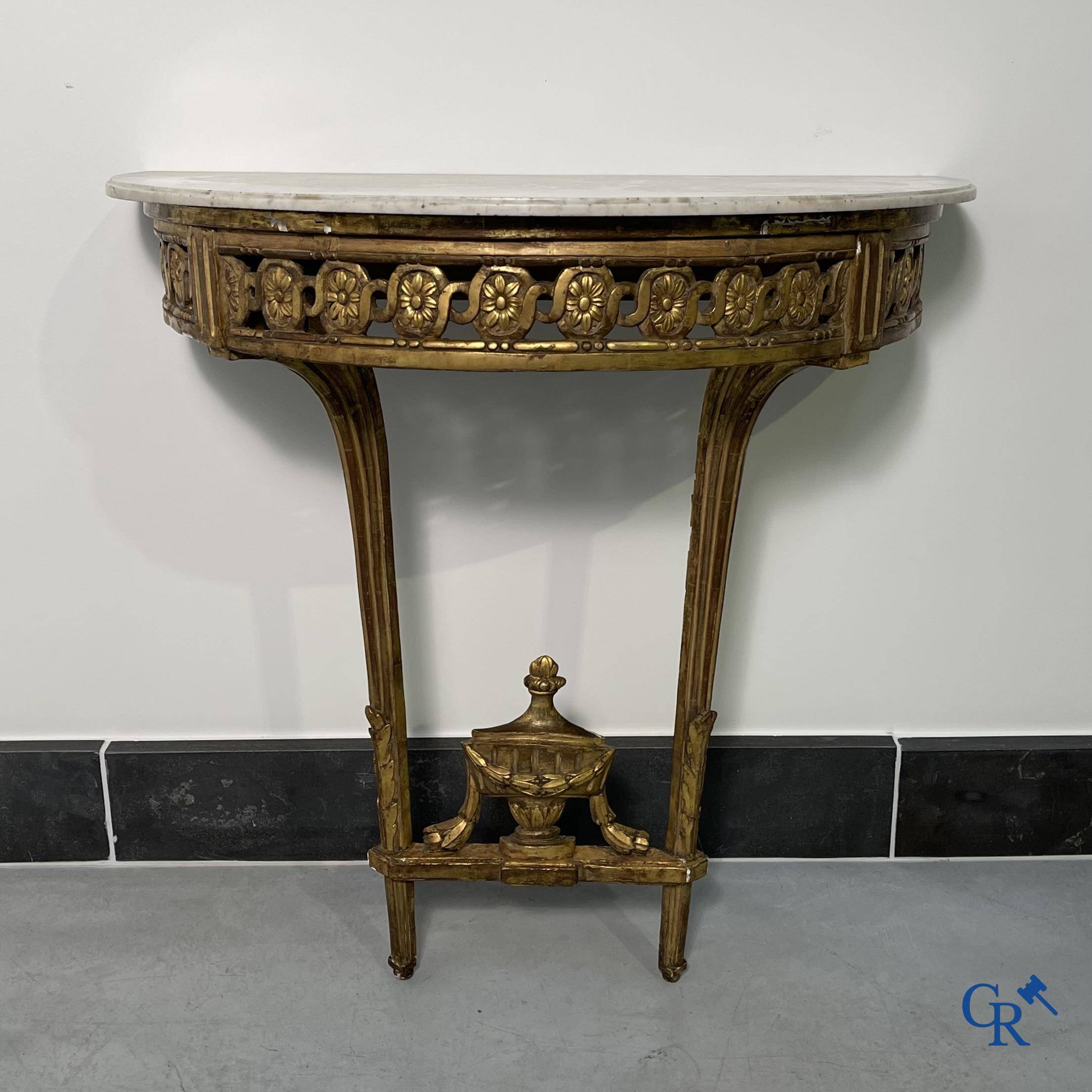 Furniture: Wood sculpted and gilded crescent shaped console. LXVI-period.