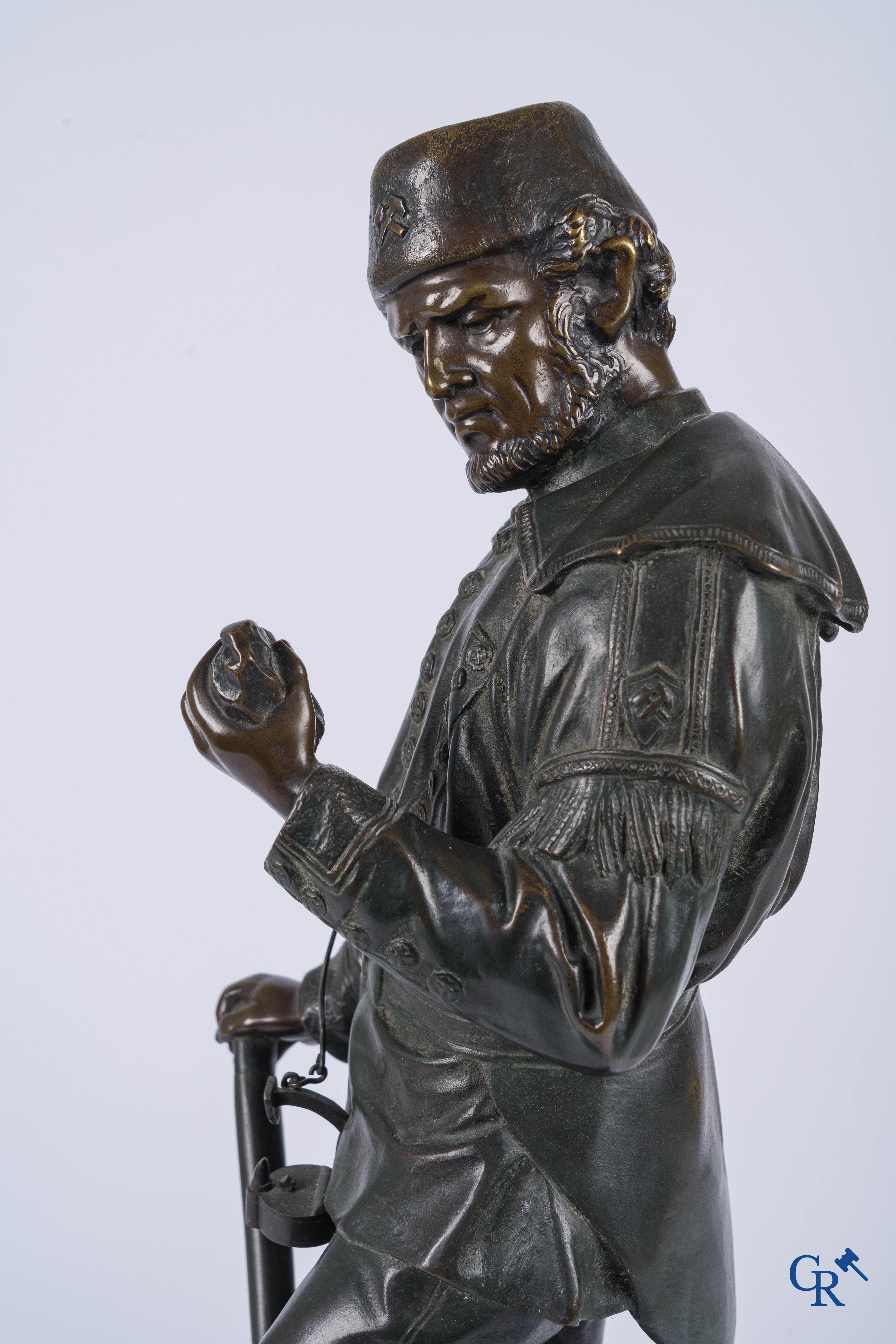 Friedrich Johann Reusch (1843-1906) Bronze, Siegerland miner investigating an iron ore.