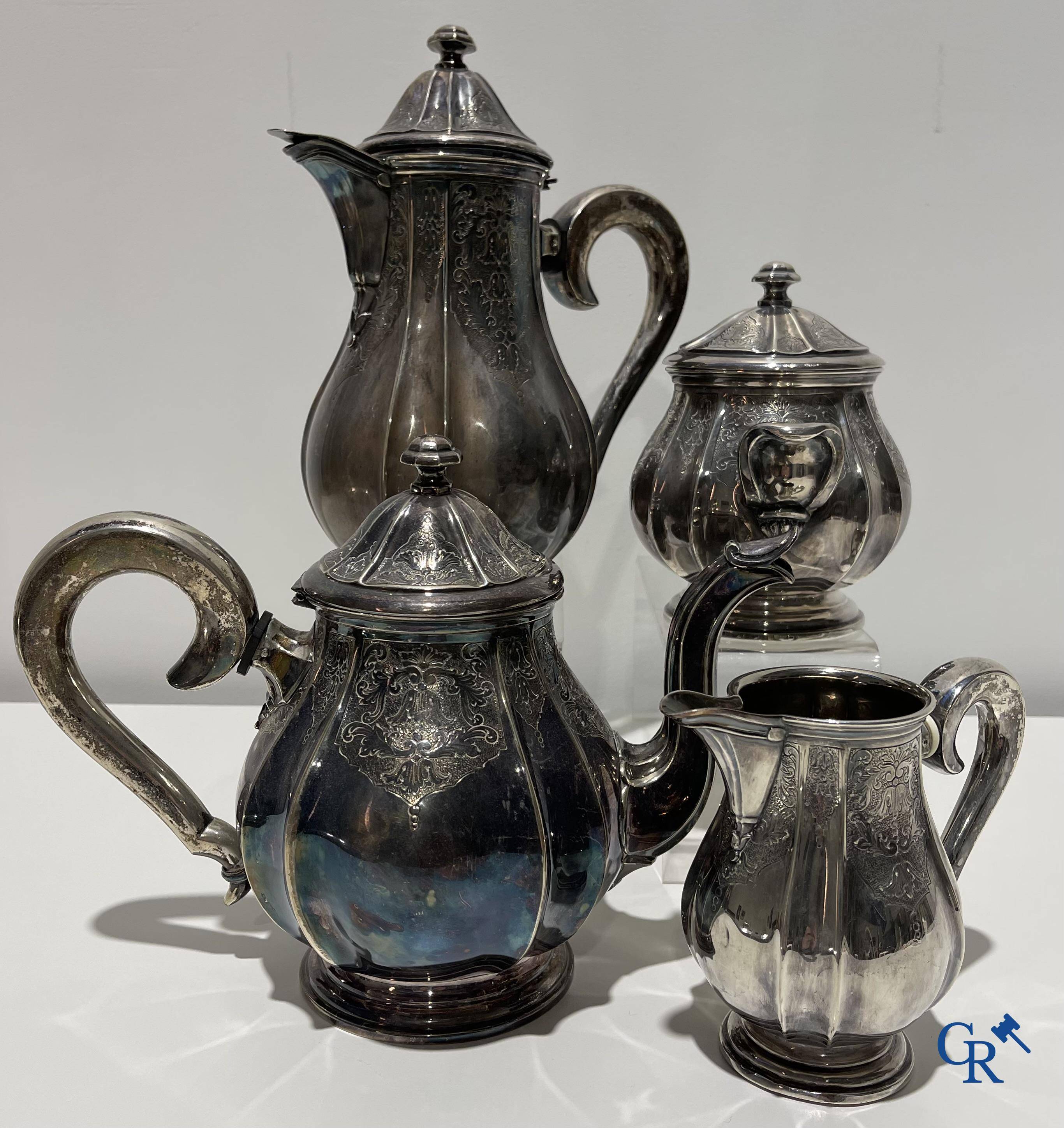 Un service à café et à thé 5 pièces en argent 835°/00.