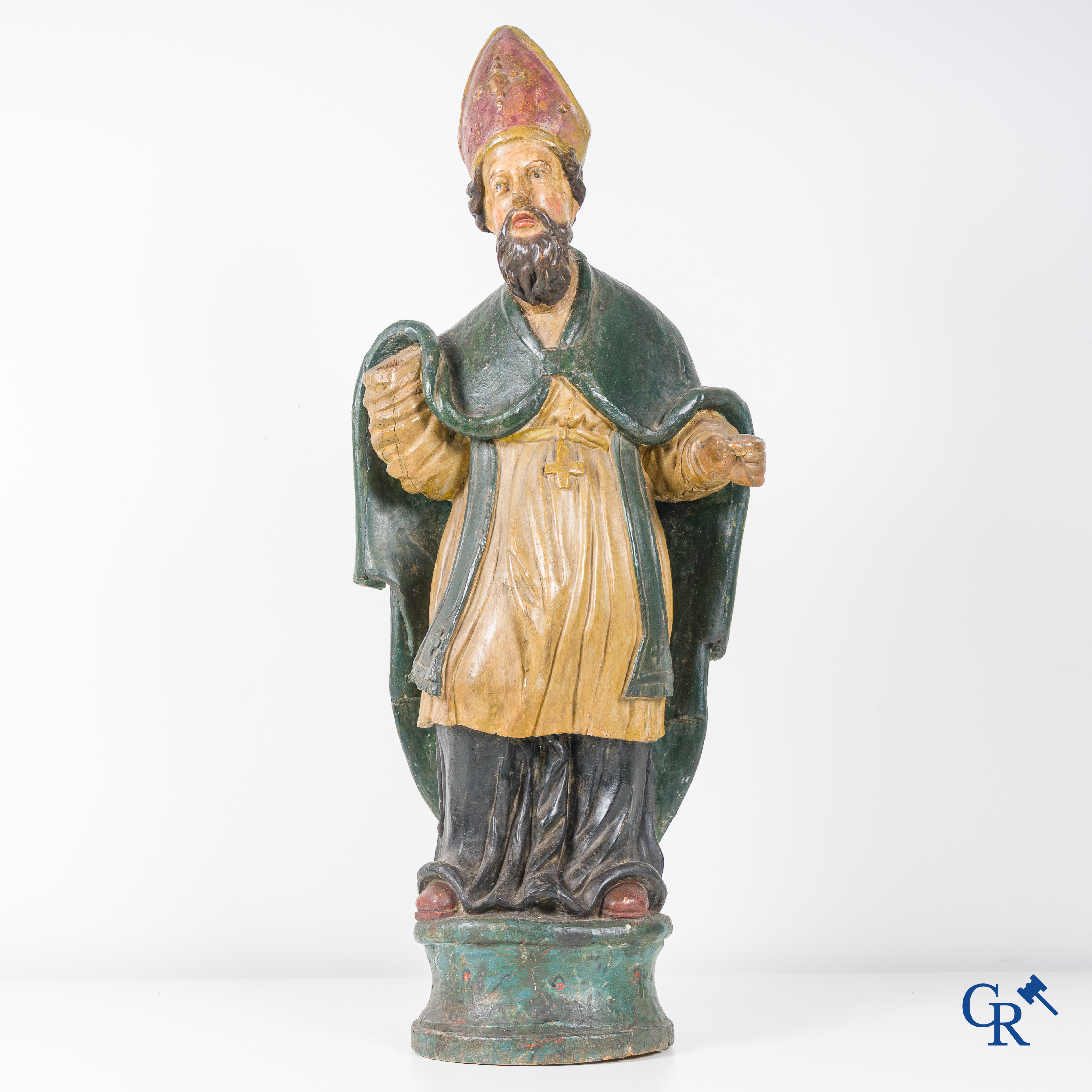 Religious objects, A wooden polychrome staute with a hollowed-out back. 18th century.