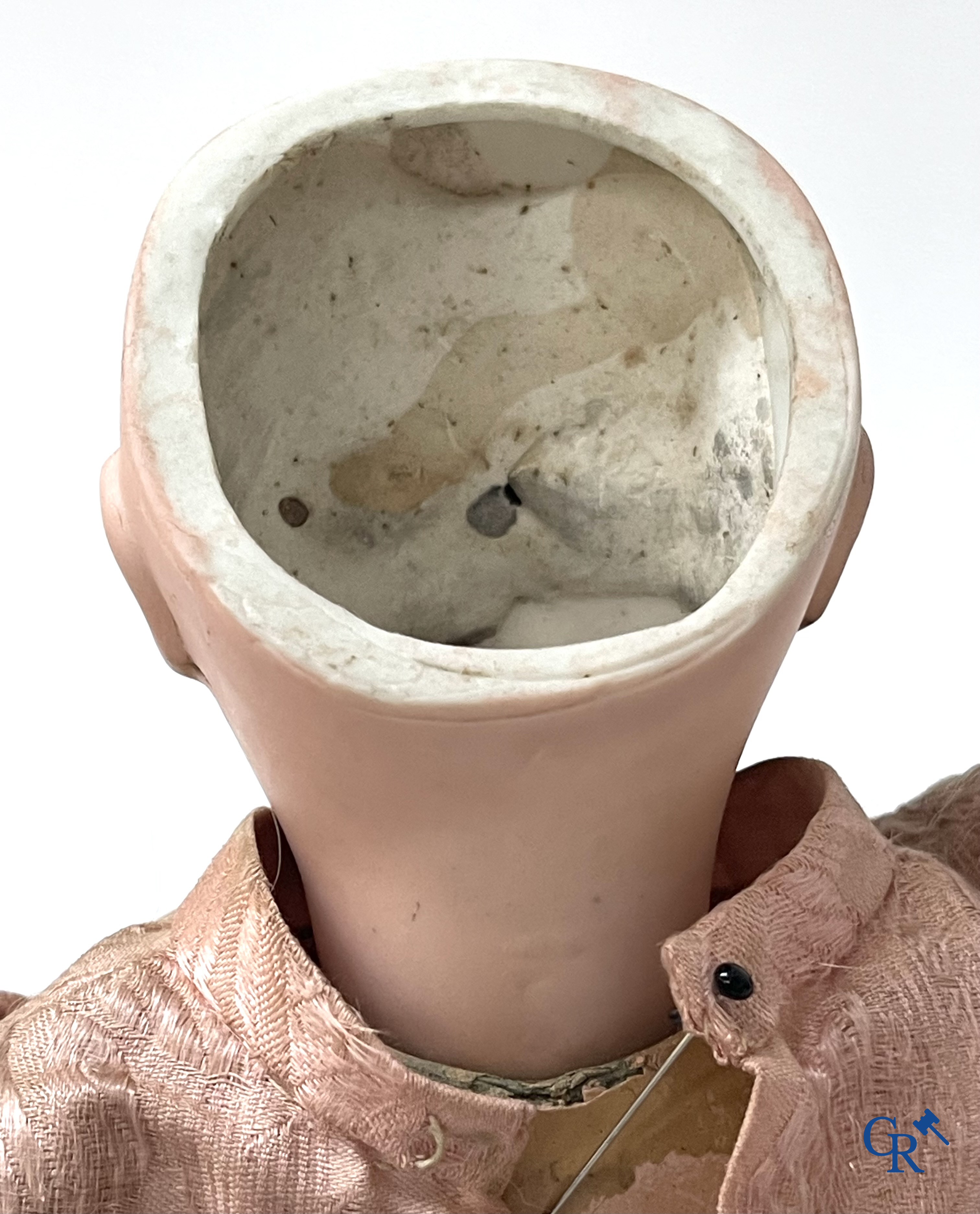 Old toys. Jumeau doll with porcelain head. Numbered 8, original clothing and shoes.