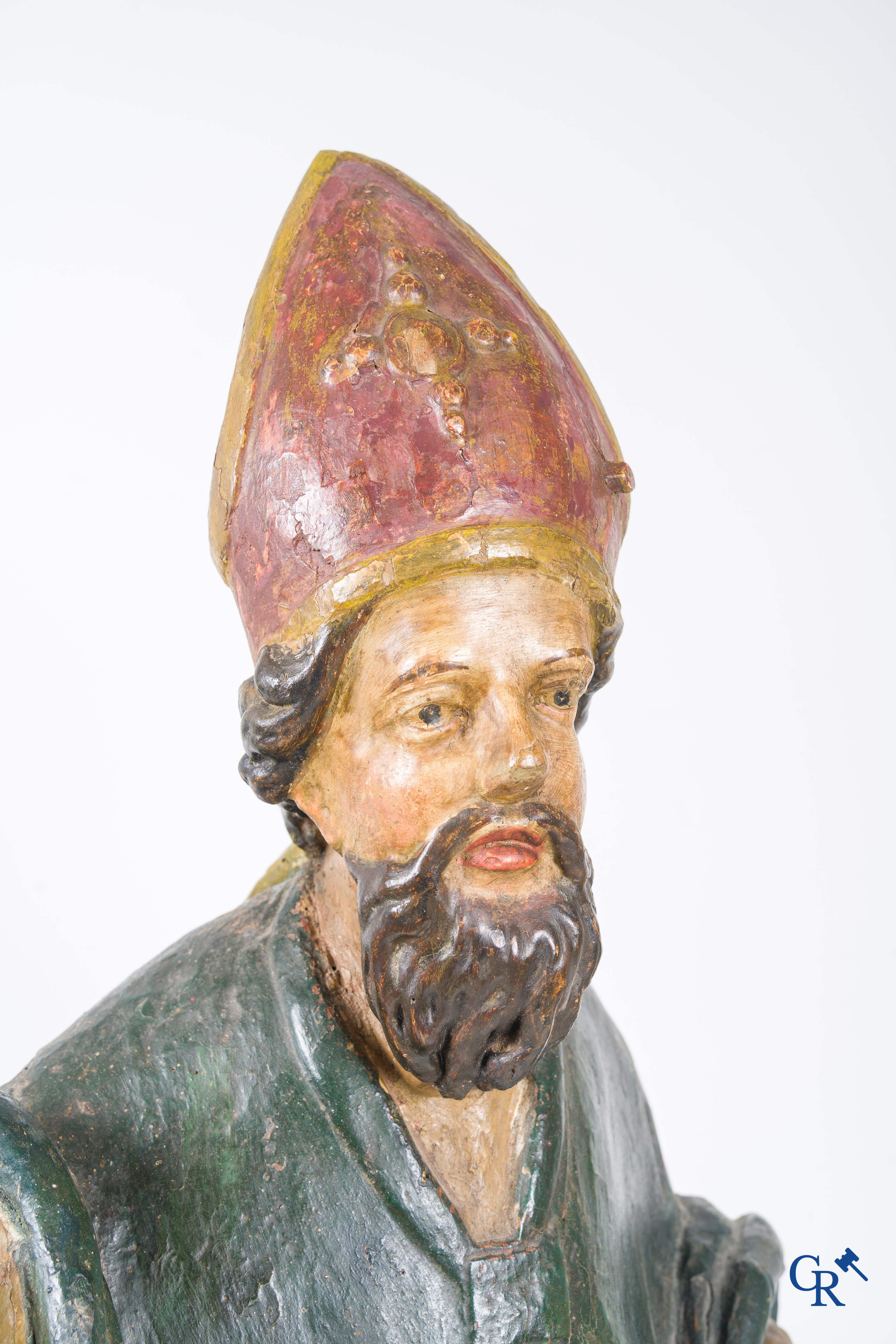 Religious objects, A wooden polychrome staute with a hollowed-out back. 18th century.