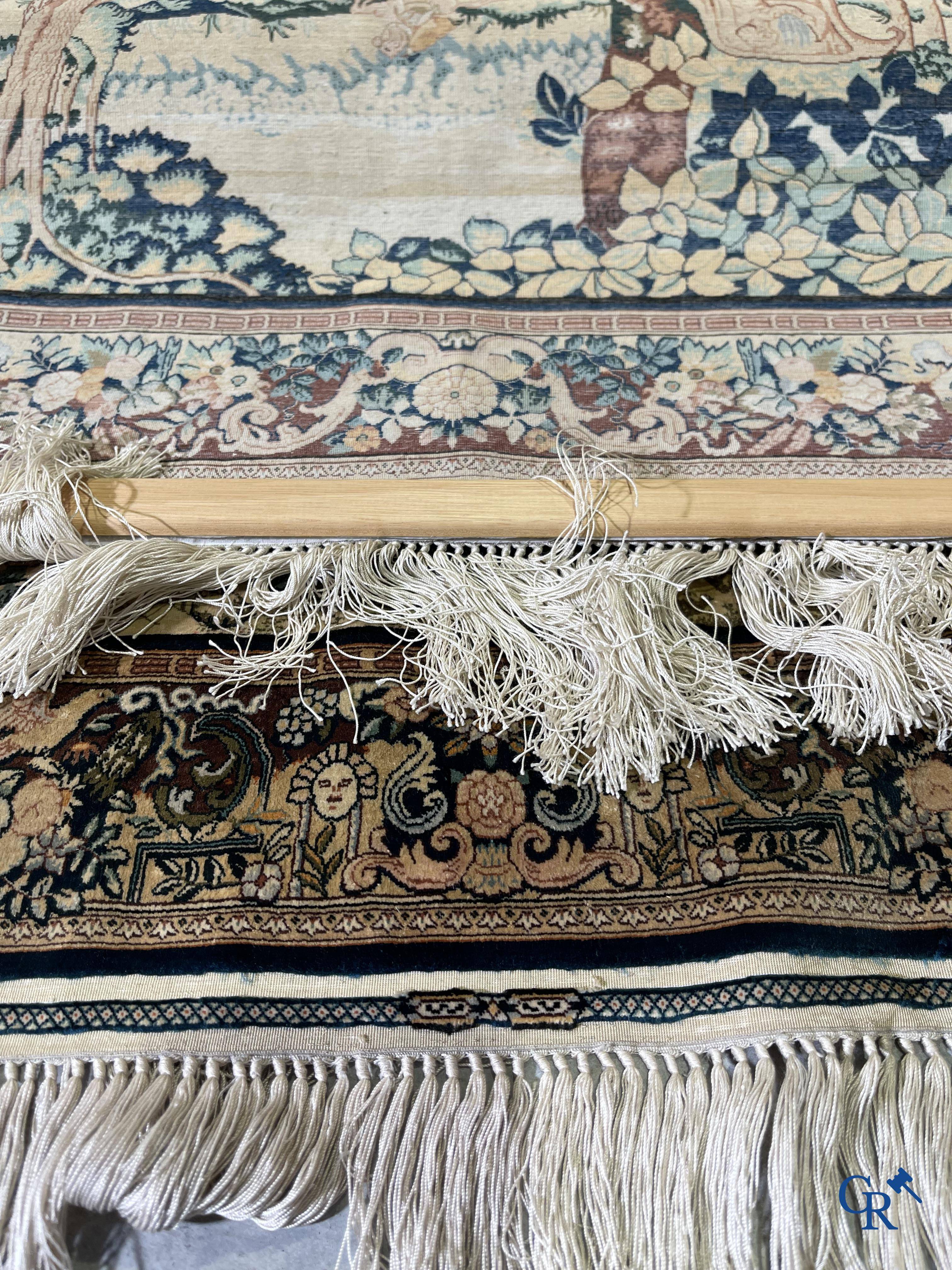 Oriental carpets, a finely knotted silk tapestry with Renaissance scenes. Signed.