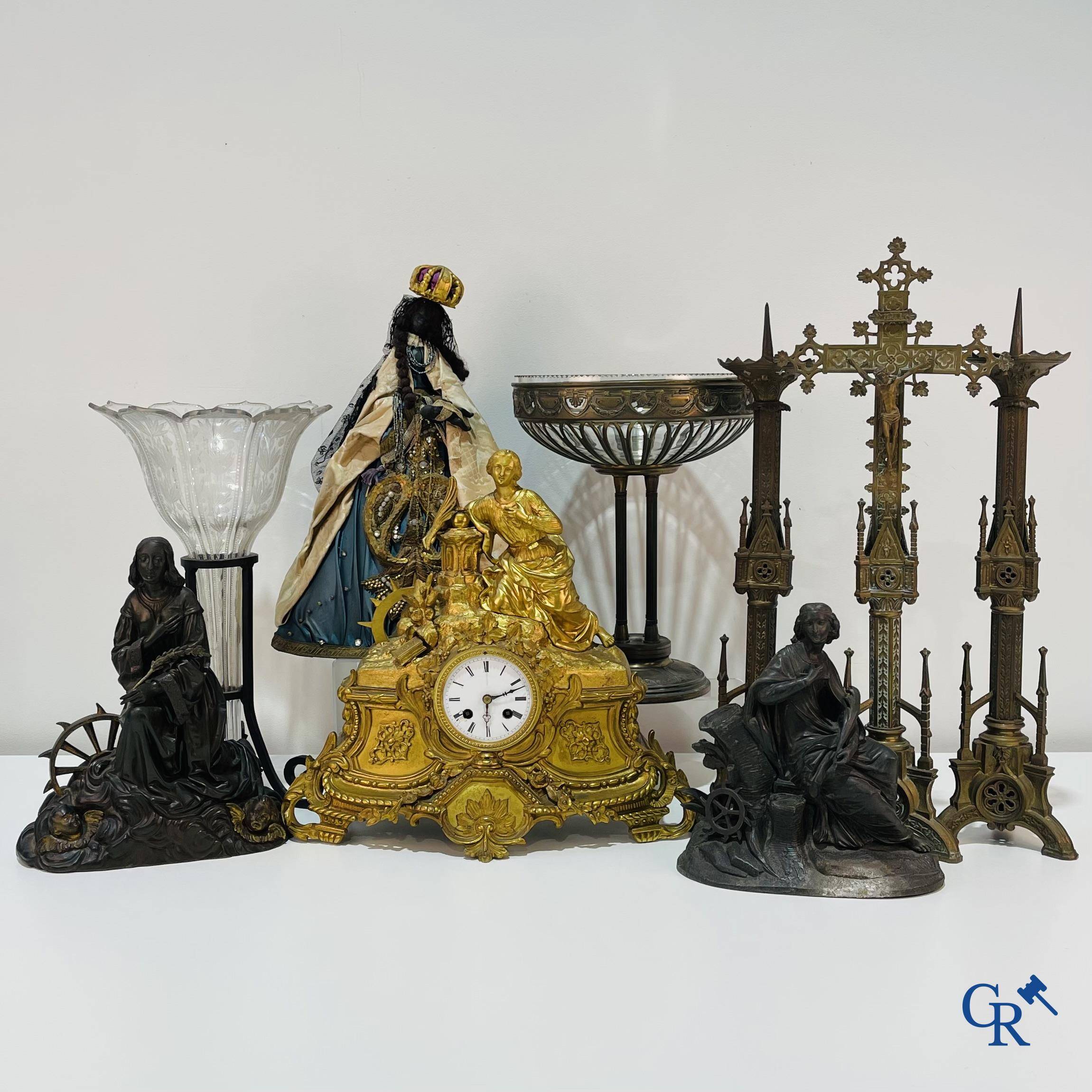 A lot with brocante: Bronze clock, bronze neo Gothic candlesticks and a statue of St. Catharina, soliflore etc.