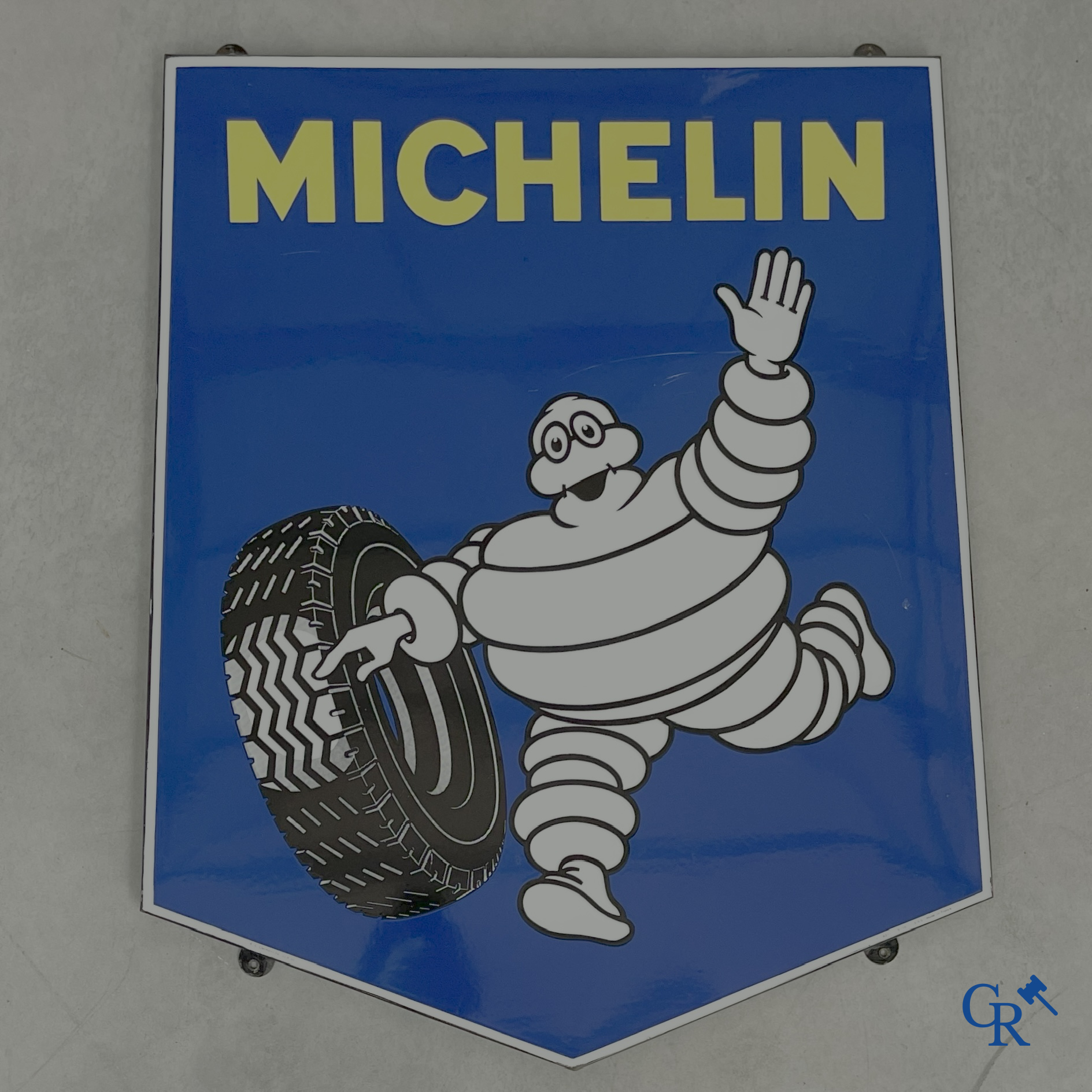 Michelin, Large enamel advertising sign of the running Bibendum with tire. Emaillerie Alsacienne Strasbourg.