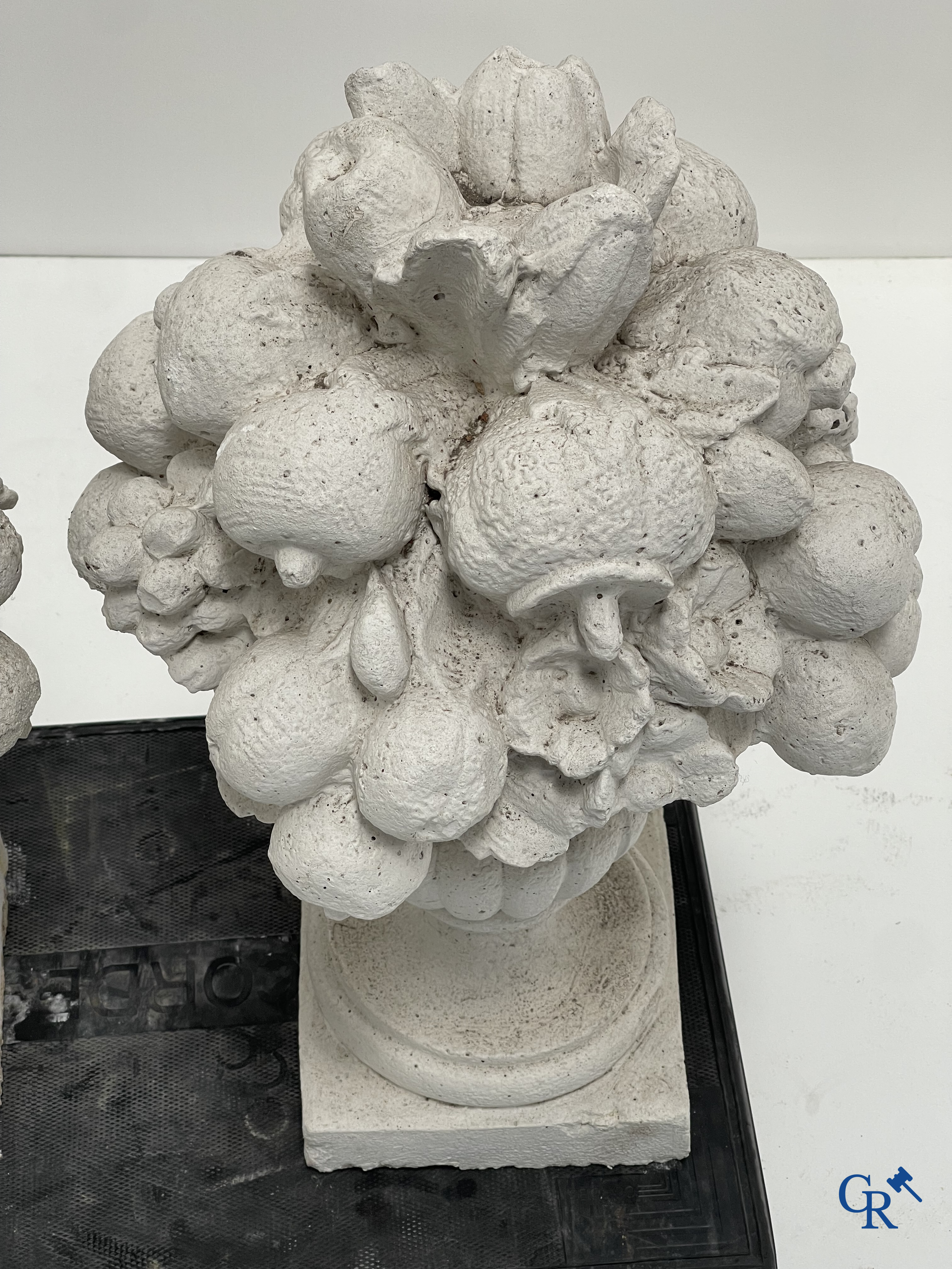 Garden decoration, a pair of stone garden ornaments.