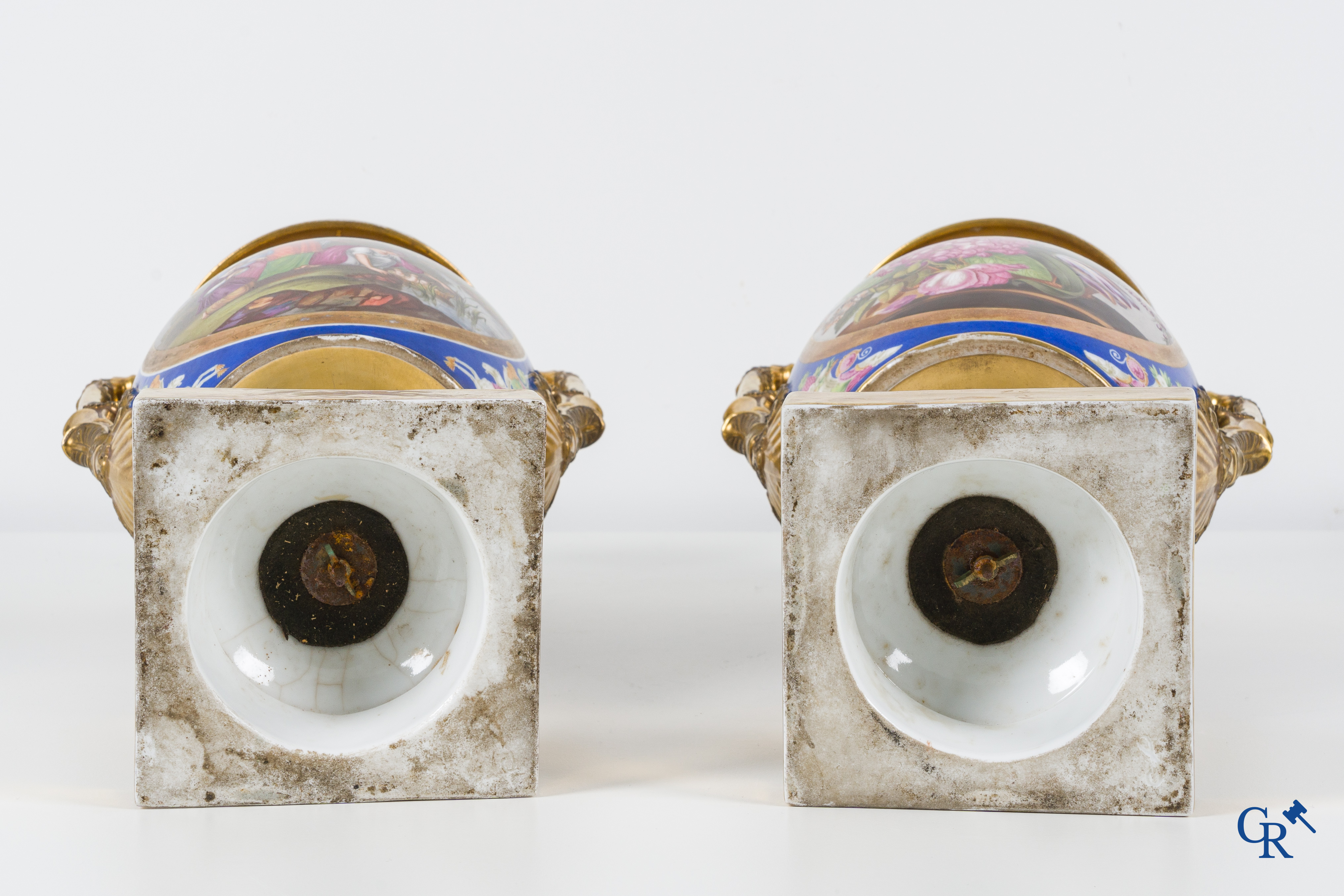 Empire, a pair of imposing multicolored decorated and gilded vases. Early 19th century.