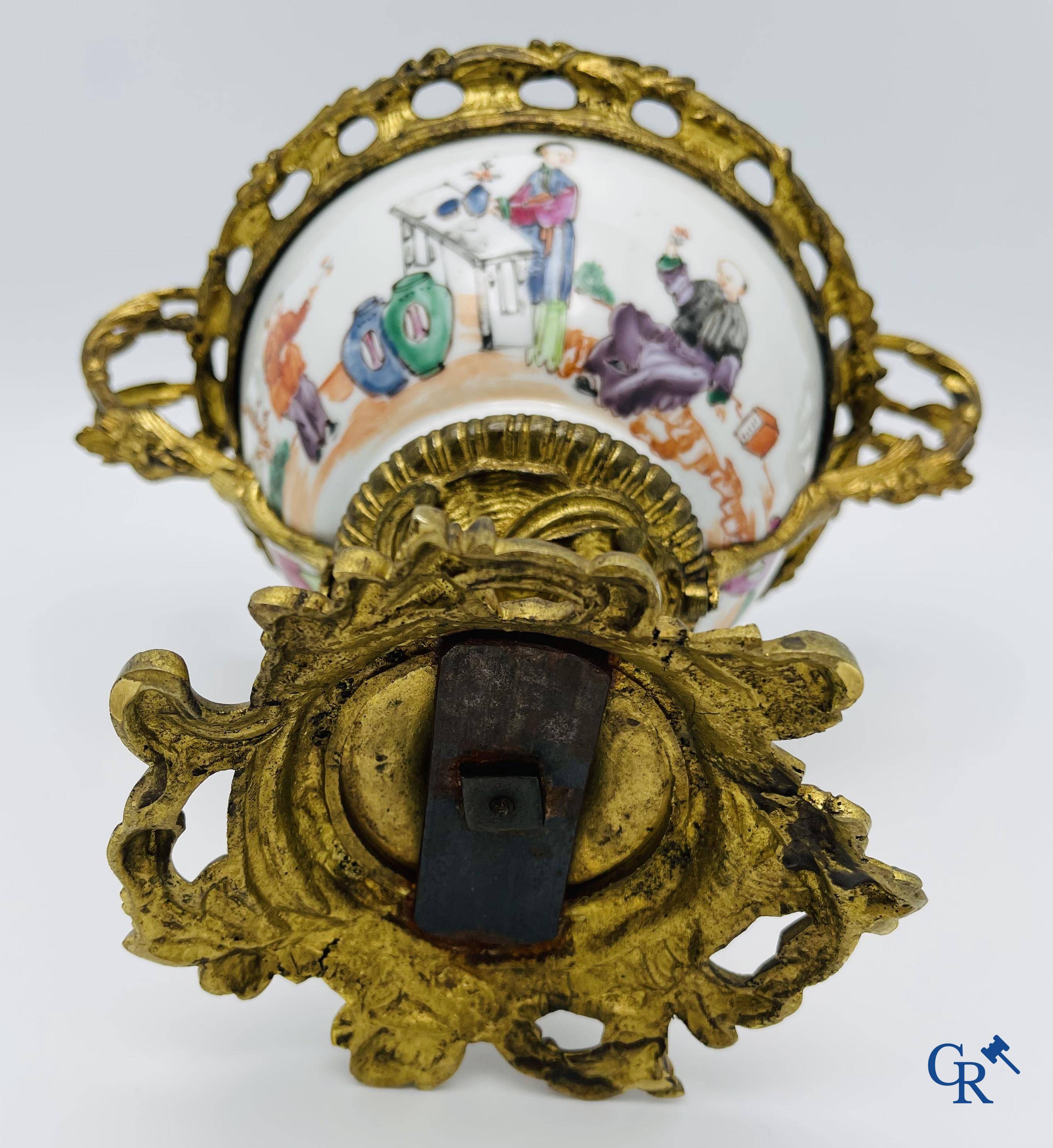 Chinese porcelain: An 18th century gilt-bronze mounted bowl in Chinese export porcelain.