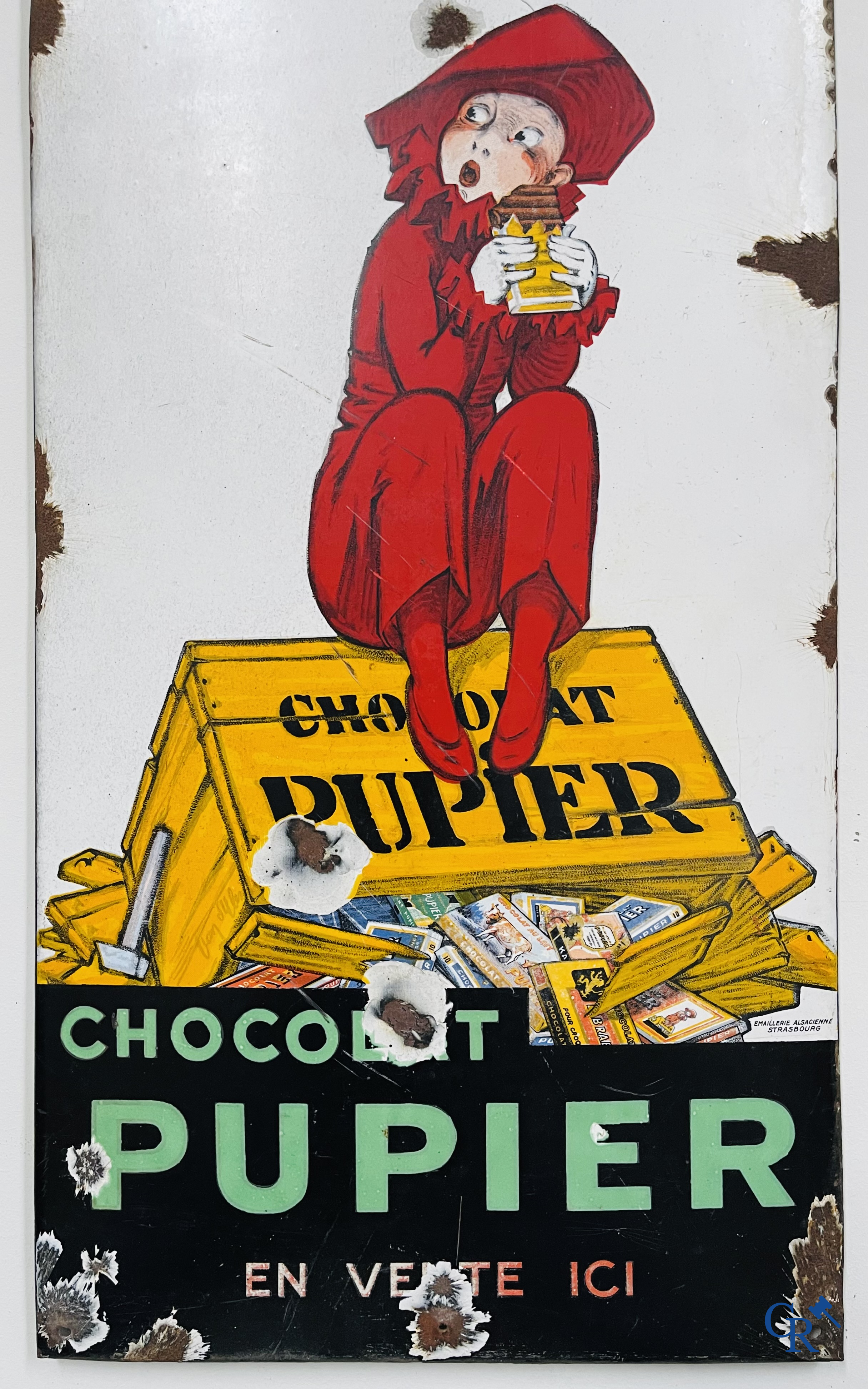 Chocolat Pupier, Enamel Advertising sign illustrated with the character designed by Jean D'Ylen. 1930's.
