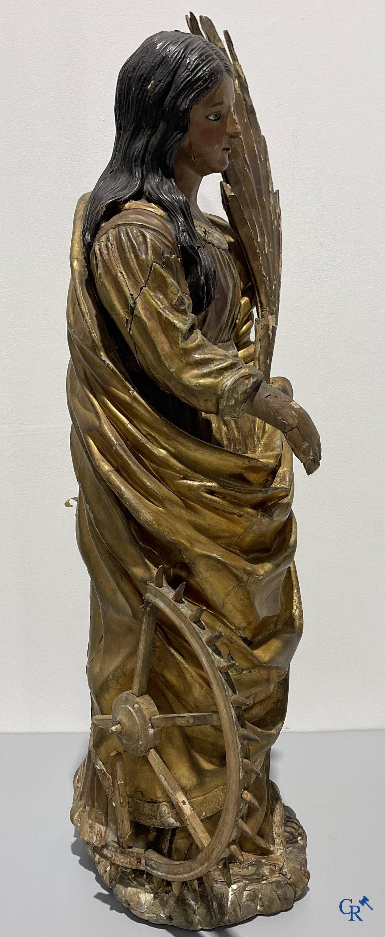 Exceptionally polychrome wooden statue of Saint Catherine of Alexandria with glass eyes, 18th century.