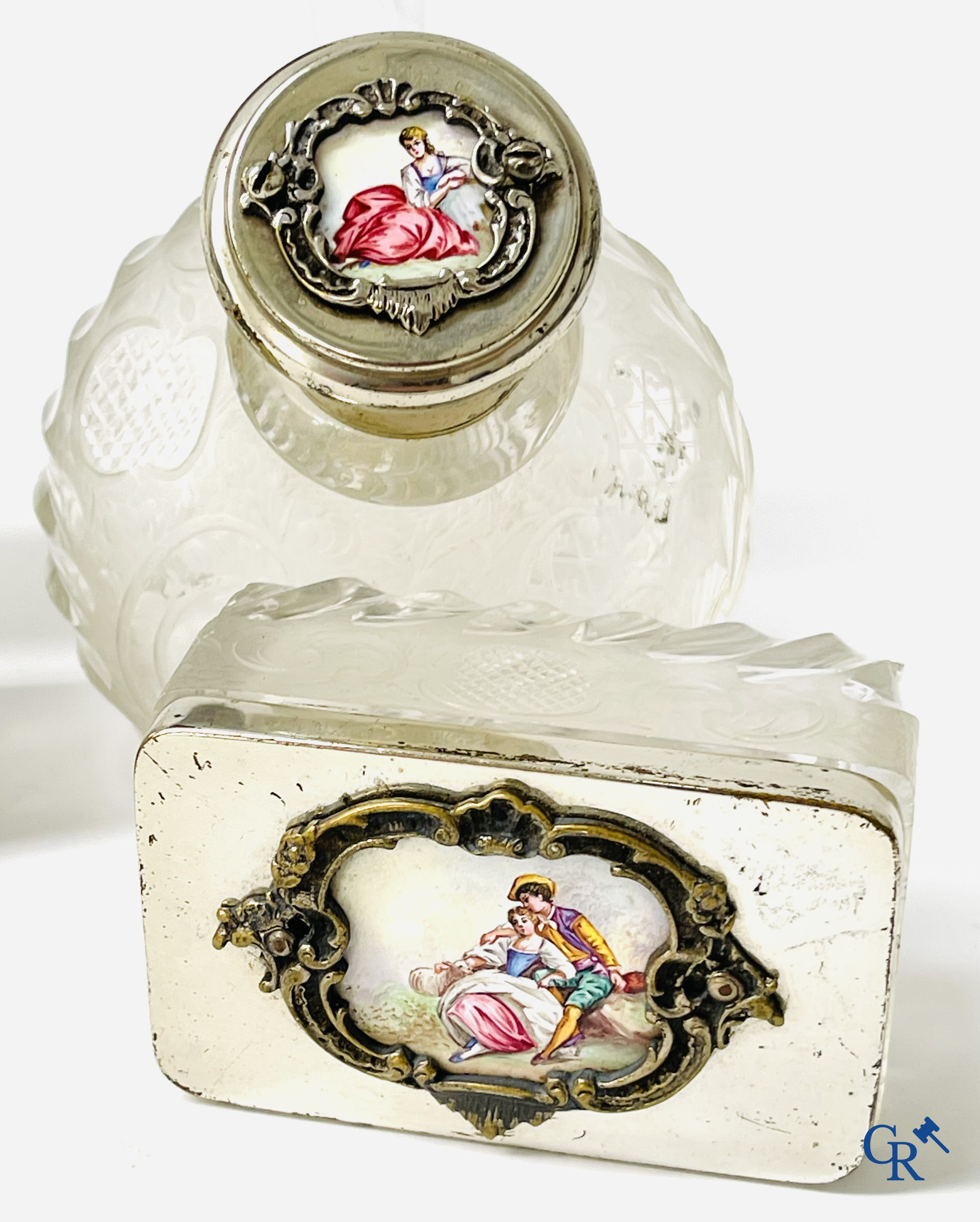 A seven-piece toilet set in silver-plated metal, finely cut crystal and enamelled plaques.