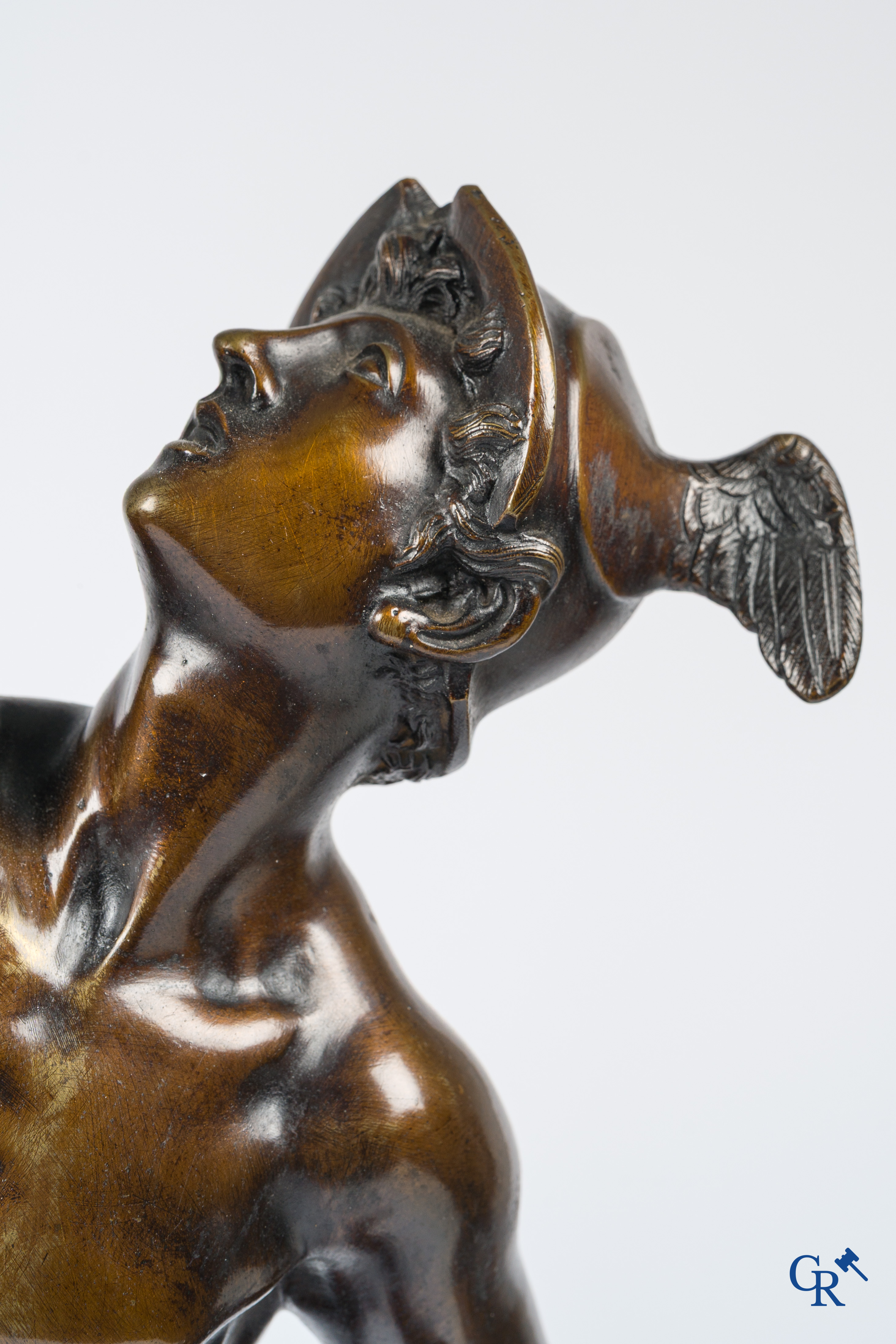 A pair of imposing bronze statues in the antique style after a model by Jean De Bologne.