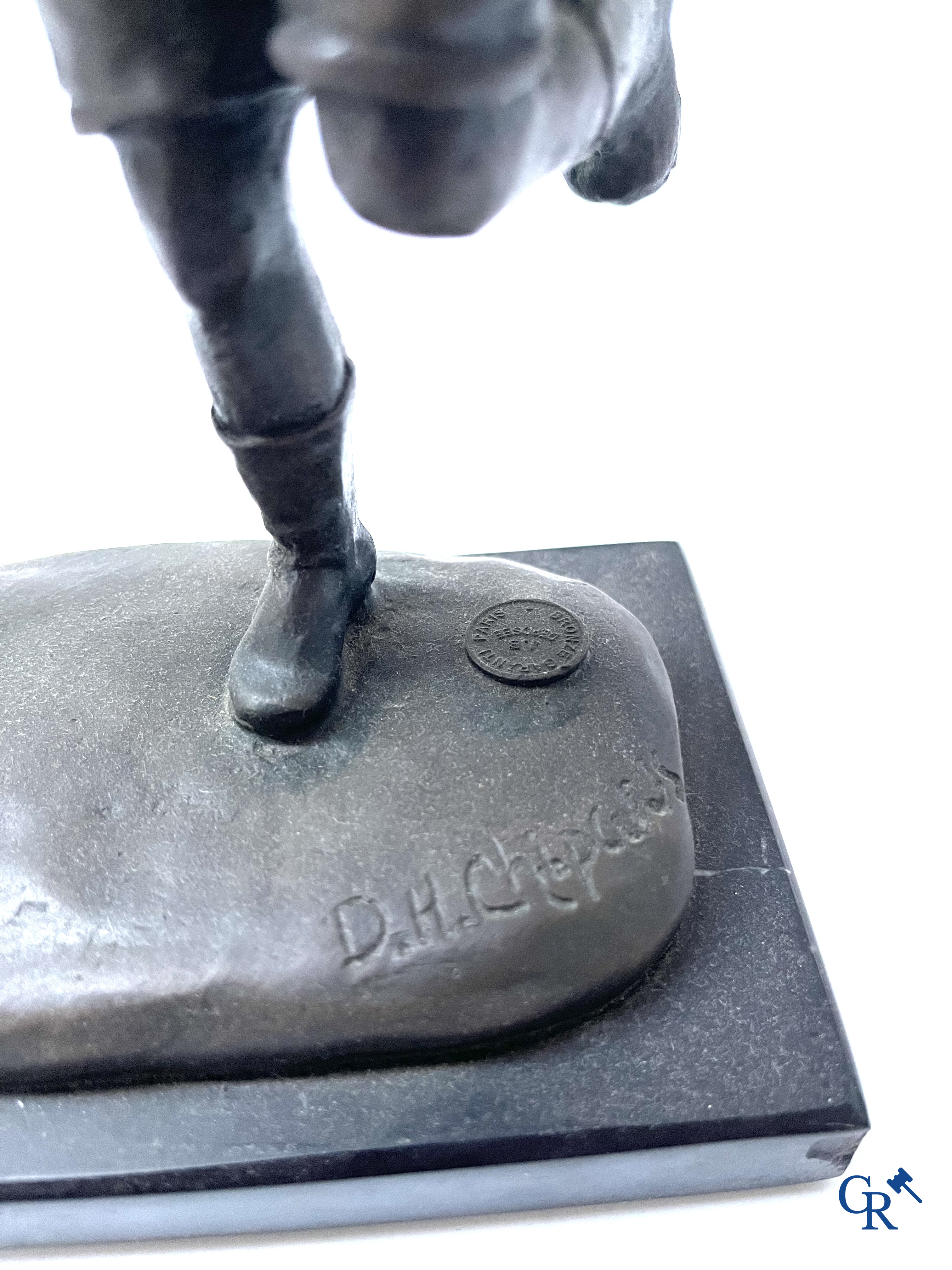 A bronze group after Raoul Larche with 5 children and a basket and 2 bronze statuettes after Chiparus. Posthumous 20th century.