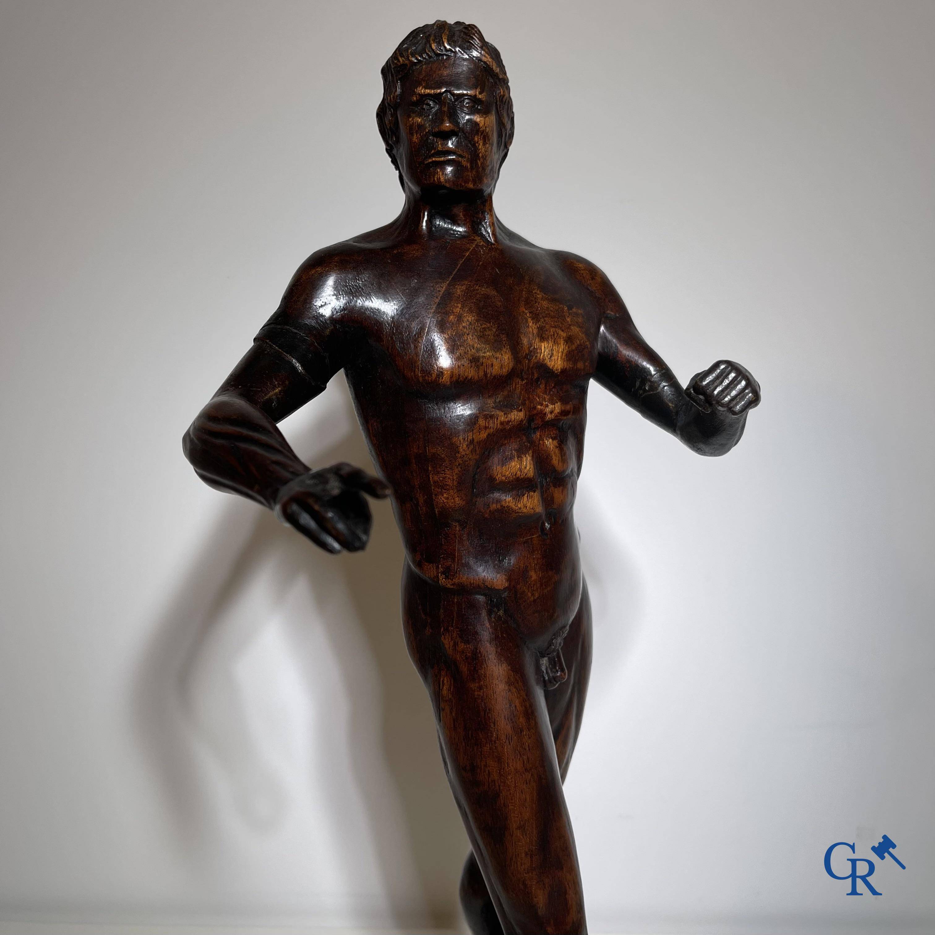 A wooden sculpted model of a standing man. Germany or Italy, 18th-19th century.