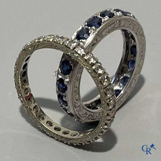 Jewellery, an American wedding ring in white gold 750°/00 and diamonds and a ring in white gold 375°/00 and sapphire.