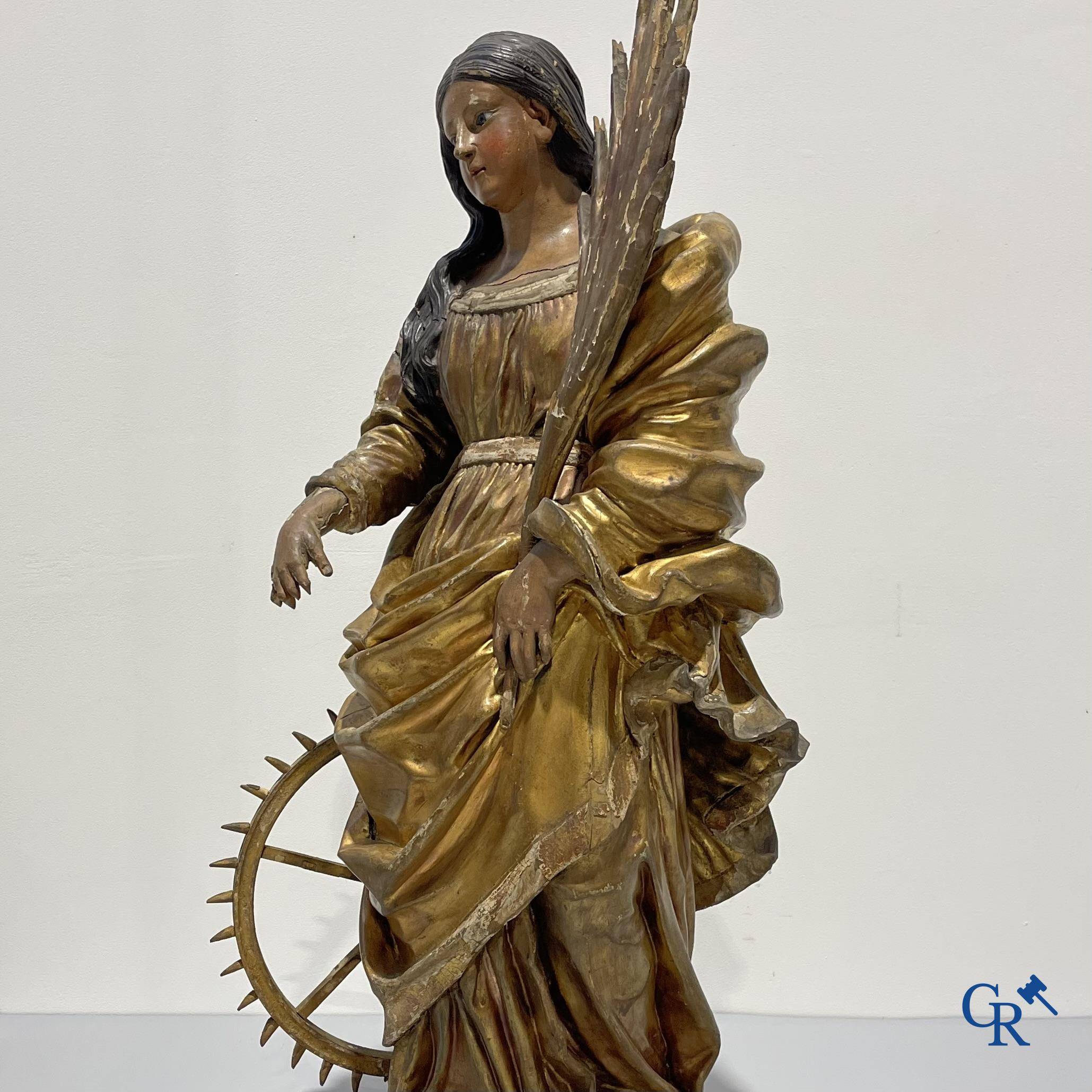 Exceptionally polychrome wooden statue of Saint Catherine of Alexandria with glass eyes, 18th century.