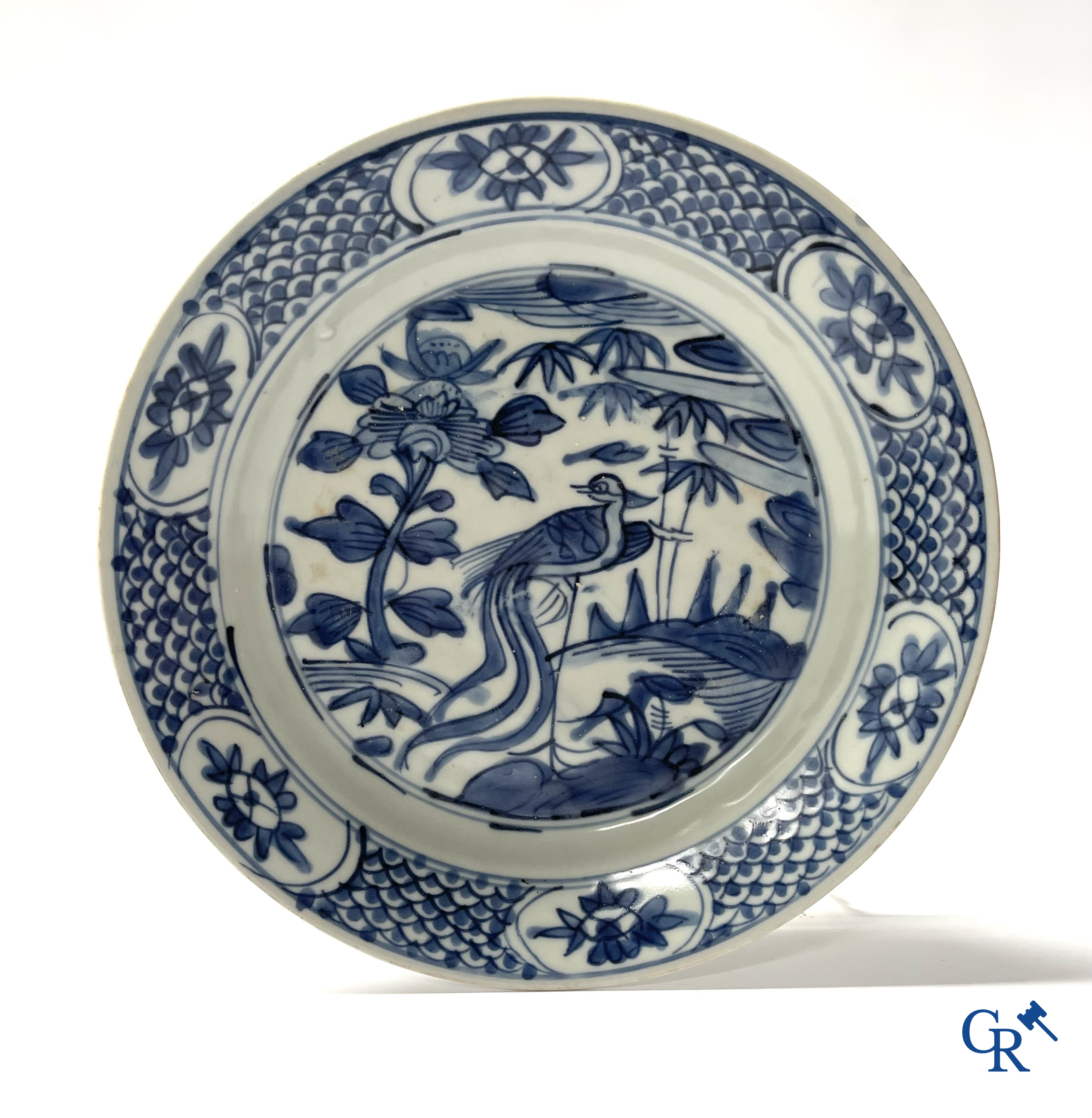 Asian Art, A pair of large Swatow Chinese blue and white dishes decorated with a peacock. Ming Dynasty. Late XVI century.