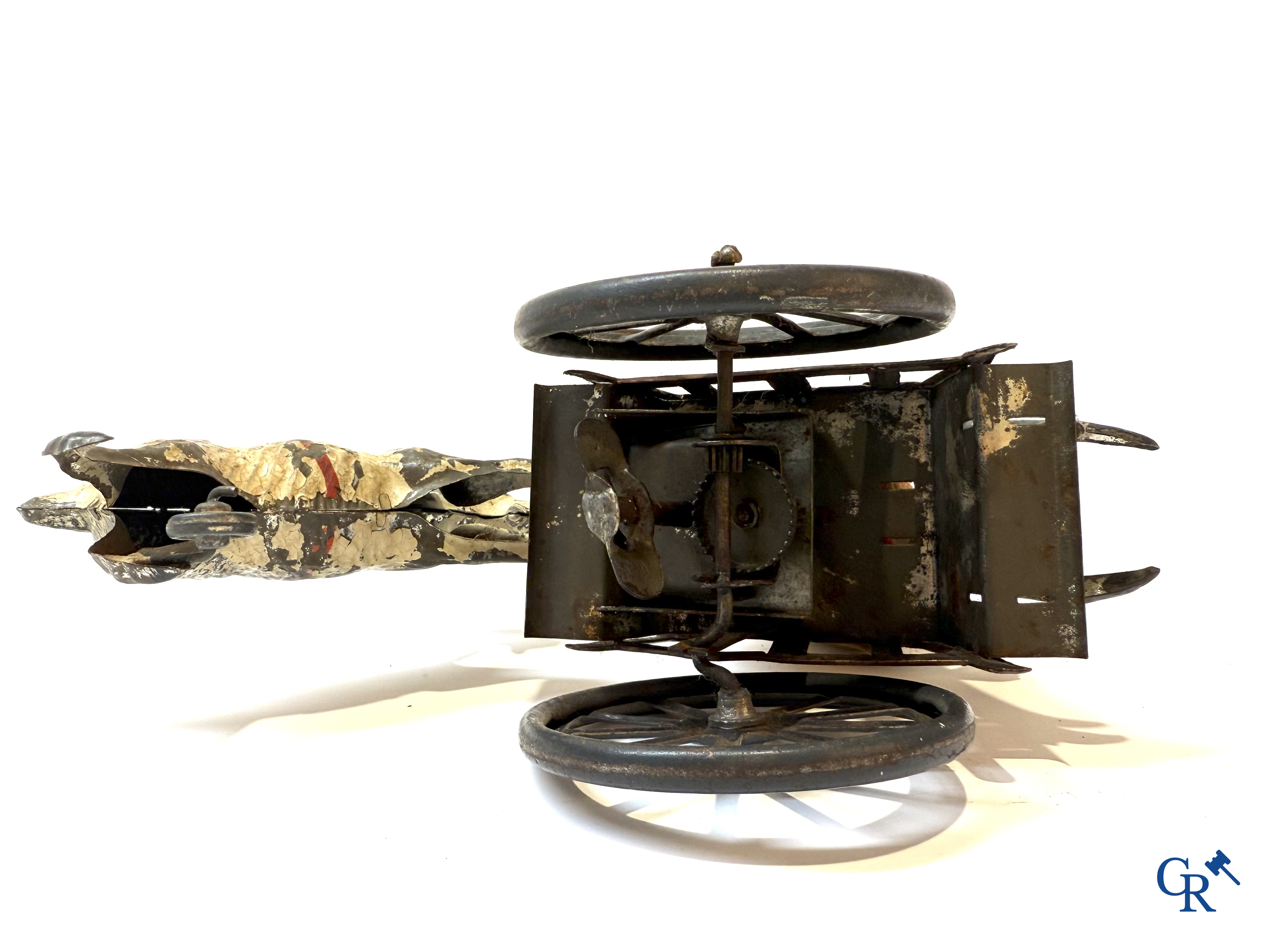 Günthermann. A mechanically painted tin toy, pierrot with goat. Germany circa 1910.