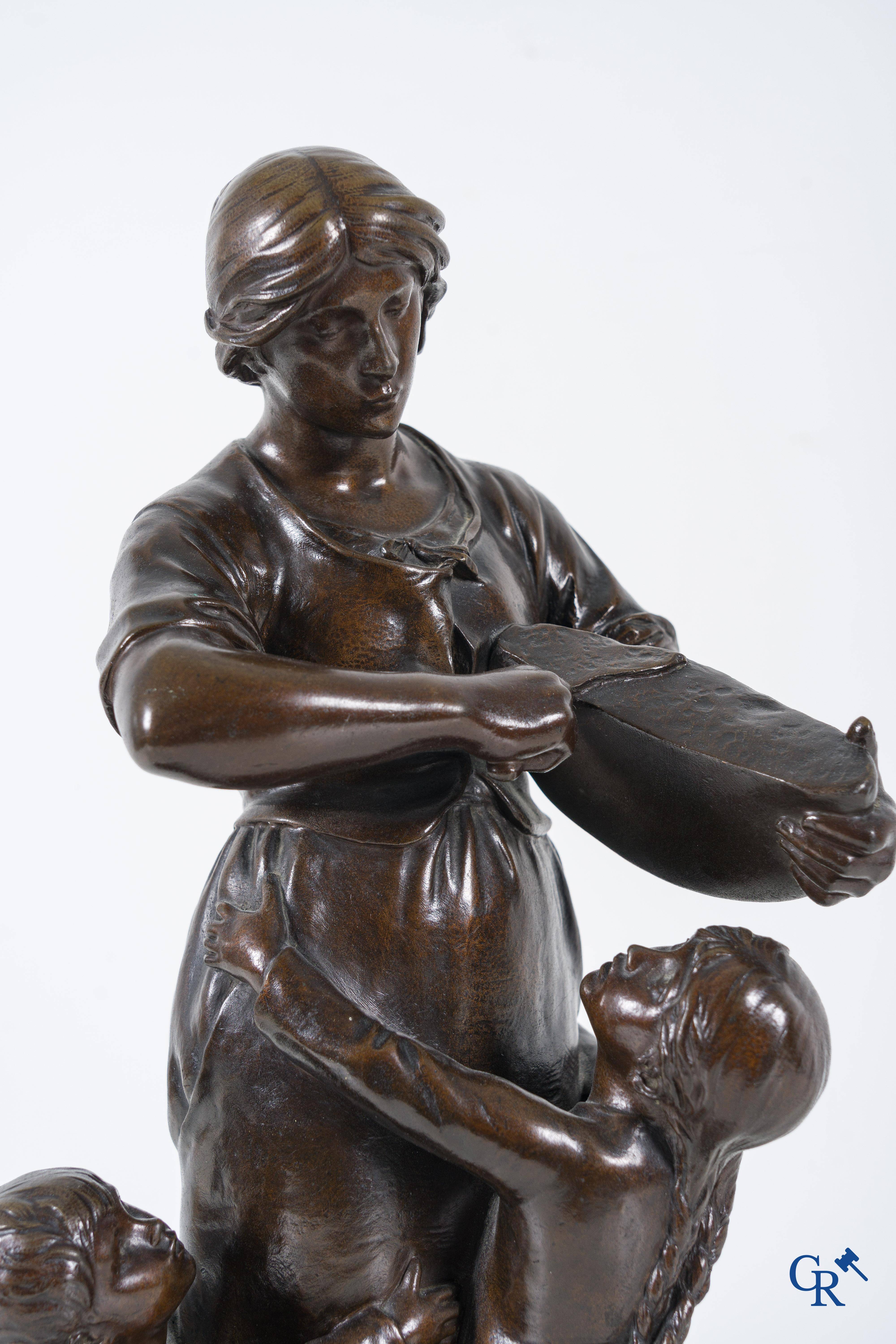 Albert Le Feuvre (1845-1924) "Le Pain" Bronze statue with dark patina.