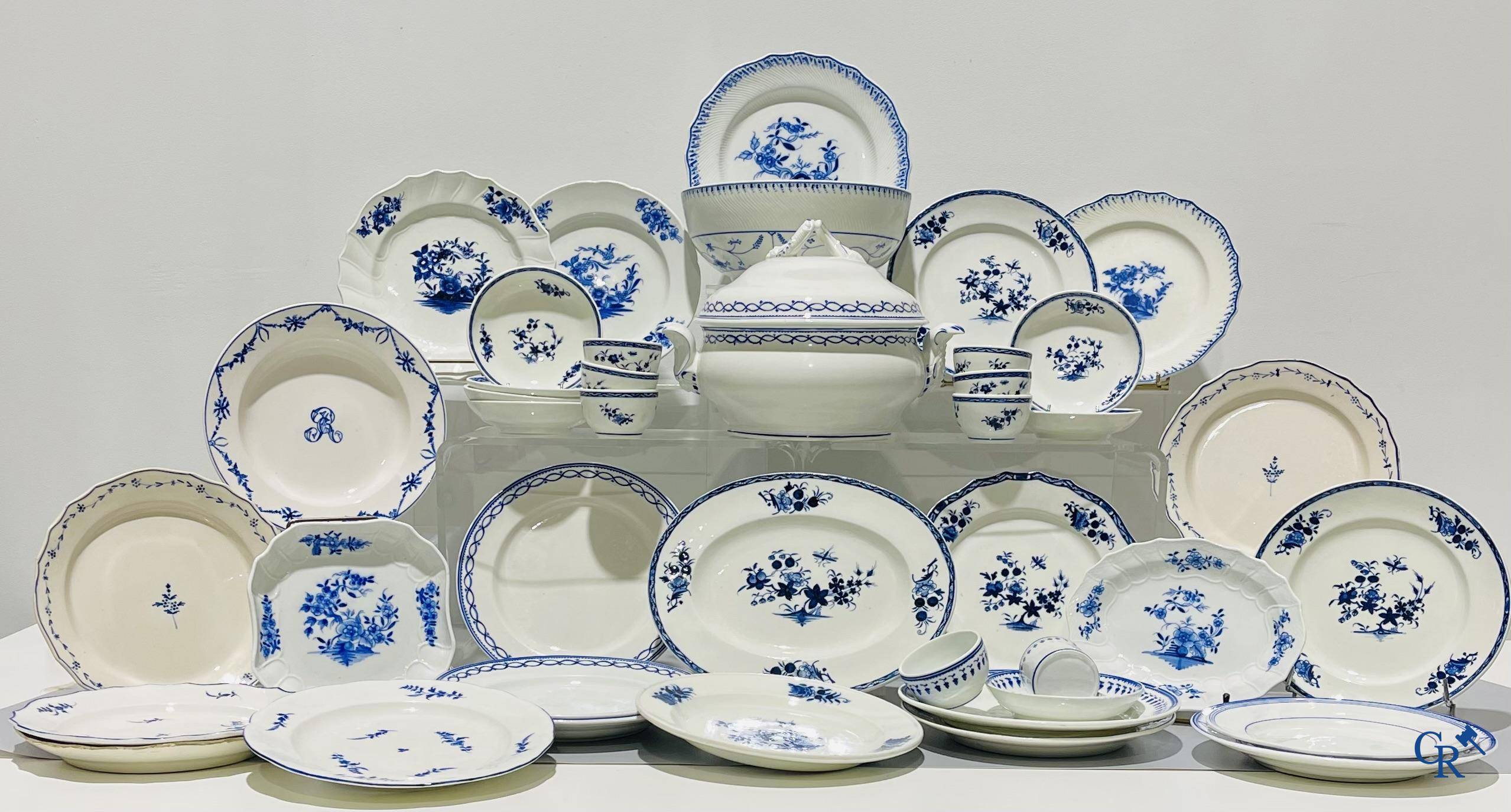 European porcelain, Tournai. A large lot of various pieces of blue and white porcelain and faience. 18th - 19th century.