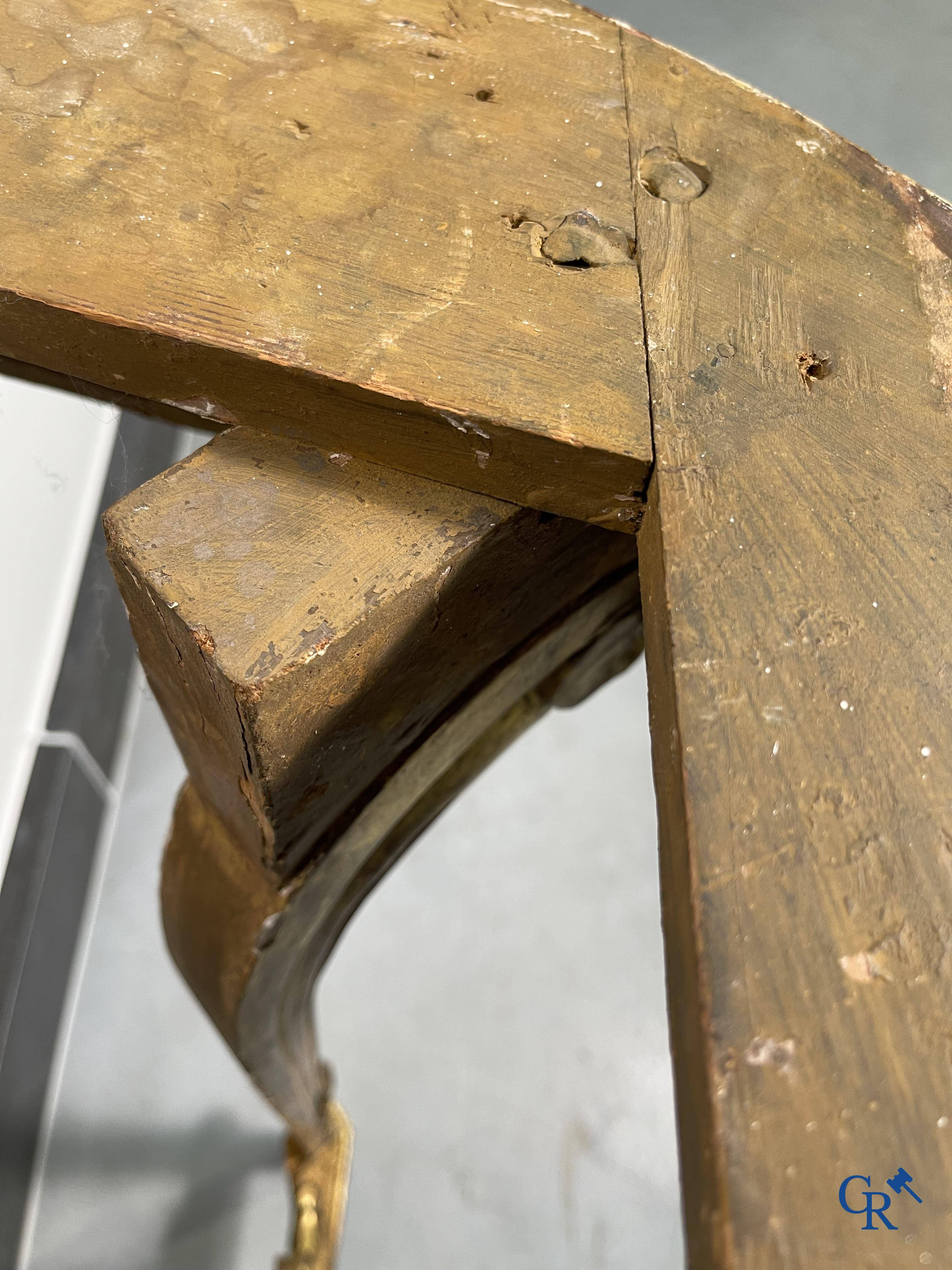 Furniture: Wood sculpted and gilded crescent shaped console. LXVI-period.
