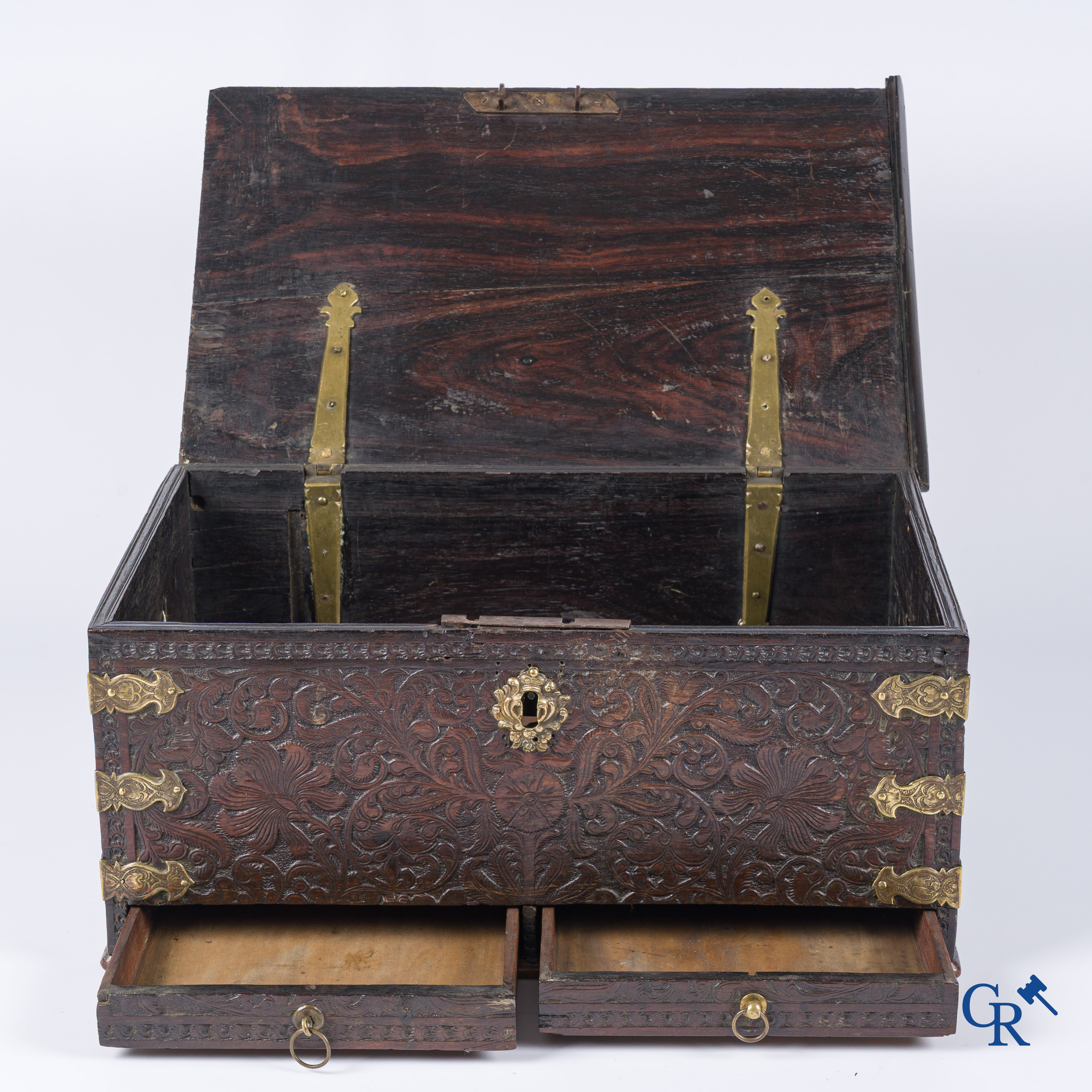 A finely carved colonial small trunk in exotic wood and bronze mounts. 17th-18th century.