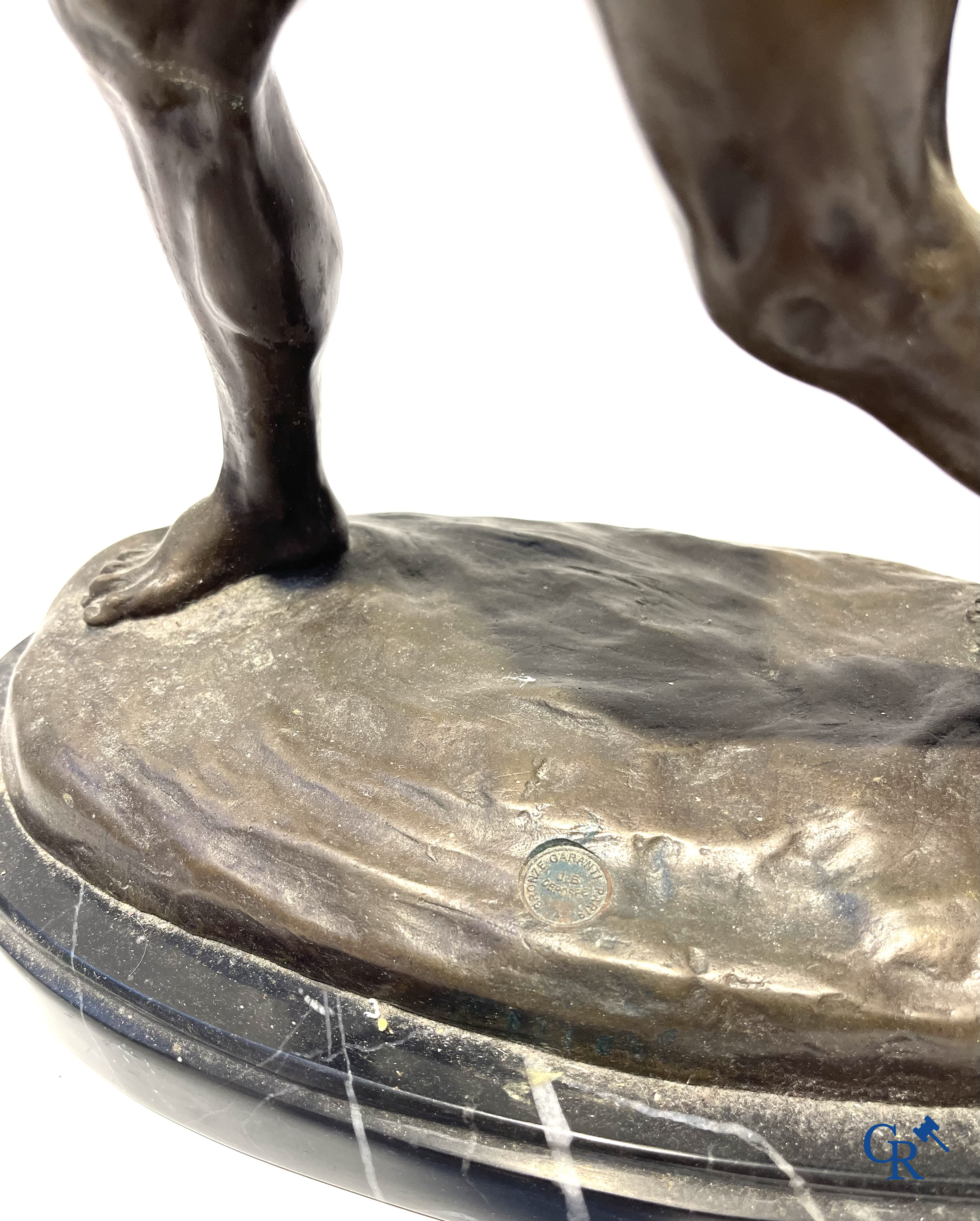 3 bronze statues after the antiques on a marble base. 20th century.