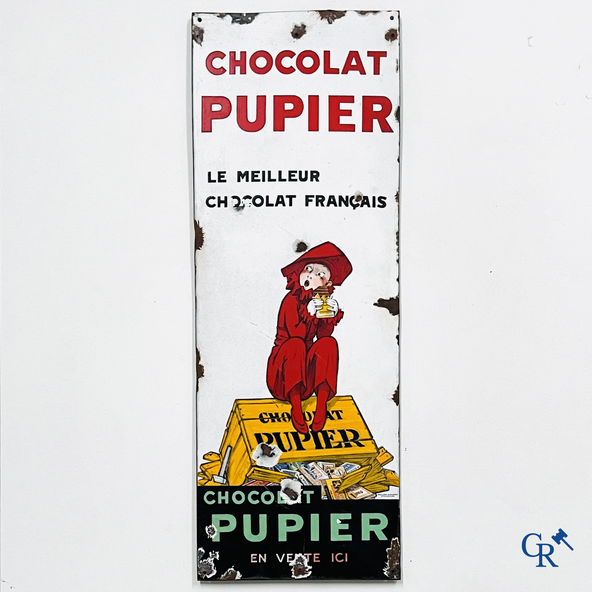 Chocolat Pupier, Enamel Advertising sign illustrated with the character designed by Jean D'Ylen. 1930's.