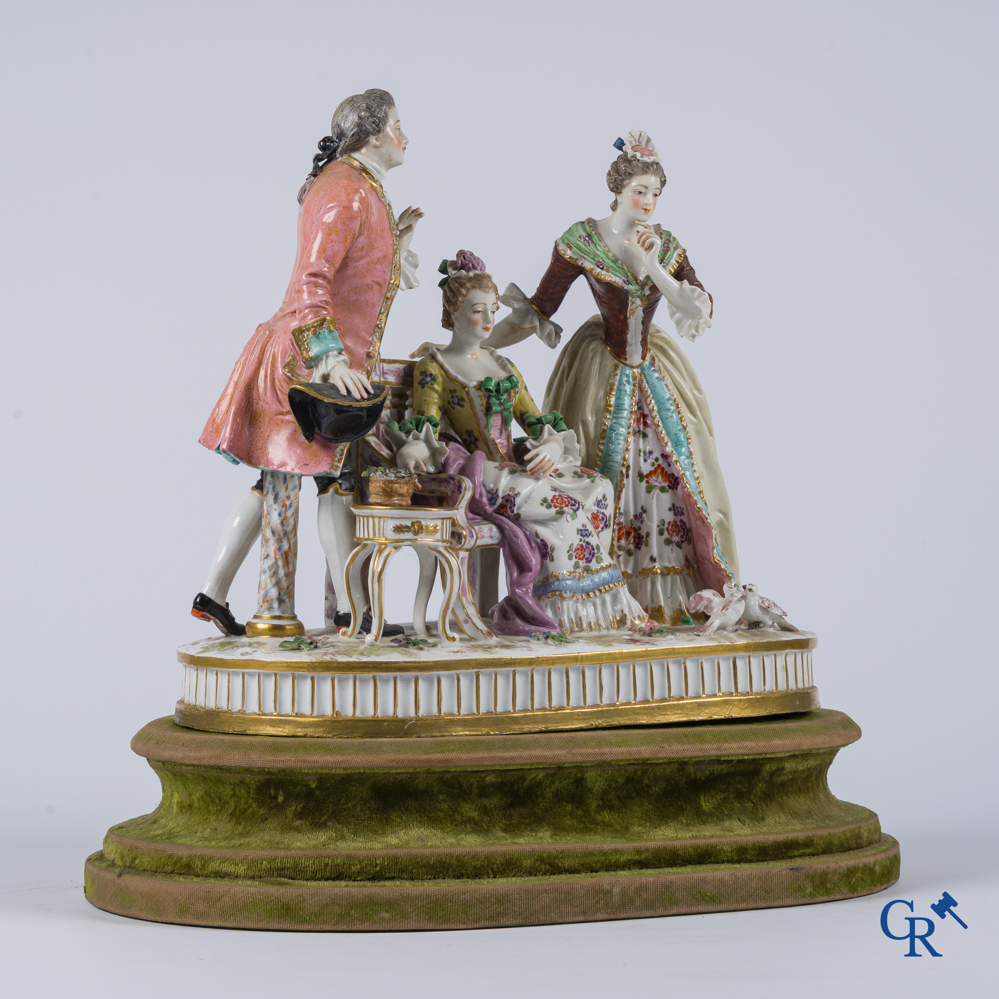 Porcelain. An exceptional group in multi-coloured and gilded porcelain. Marked. 19th century.