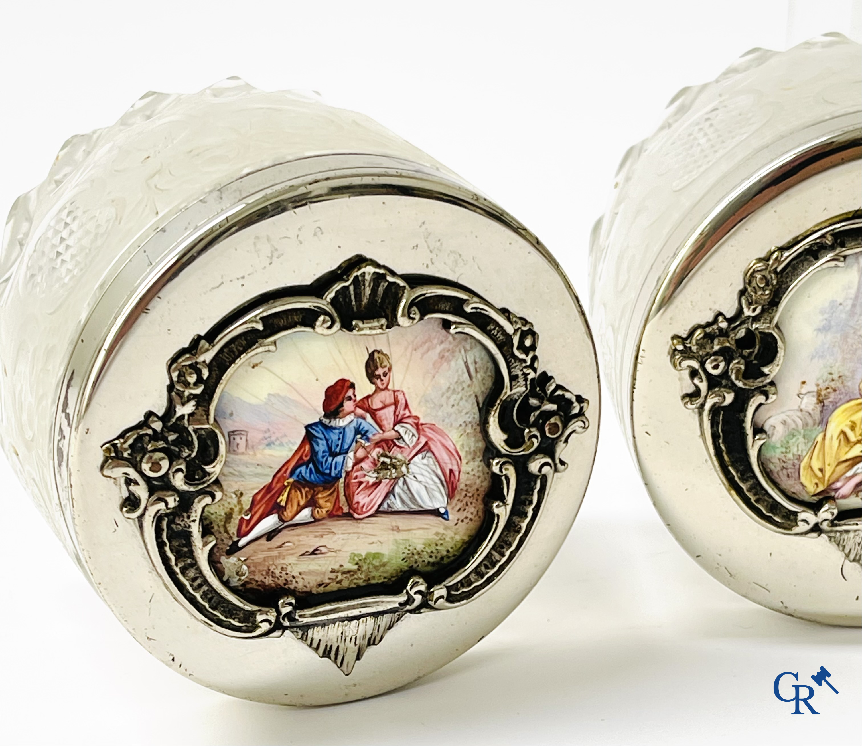 A seven-piece toilet set in silver-plated metal, finely cut crystal and enamelled plaques.