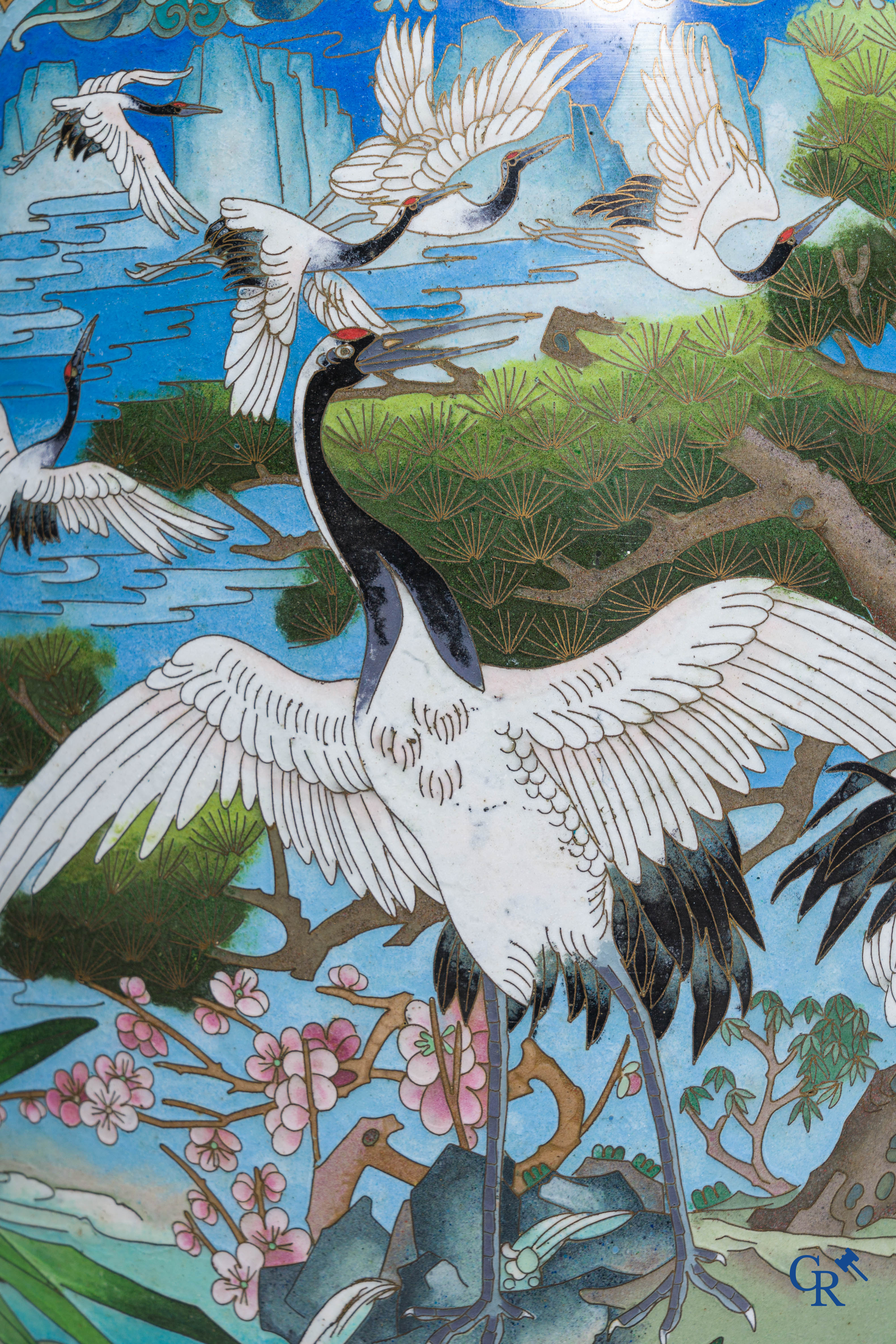 Asian Art, a massive cloisonné vase with cranes. 20th century.